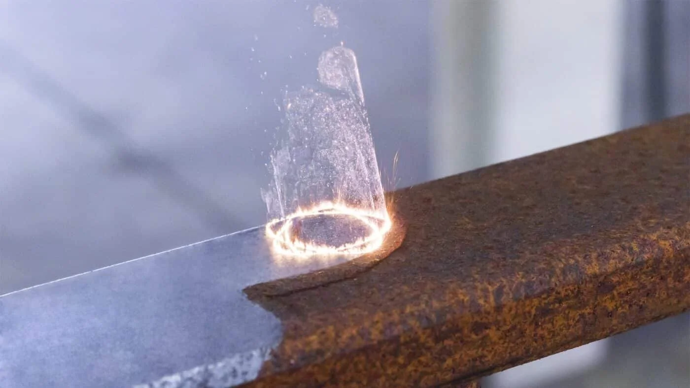 Laser ablation on rusted steel.