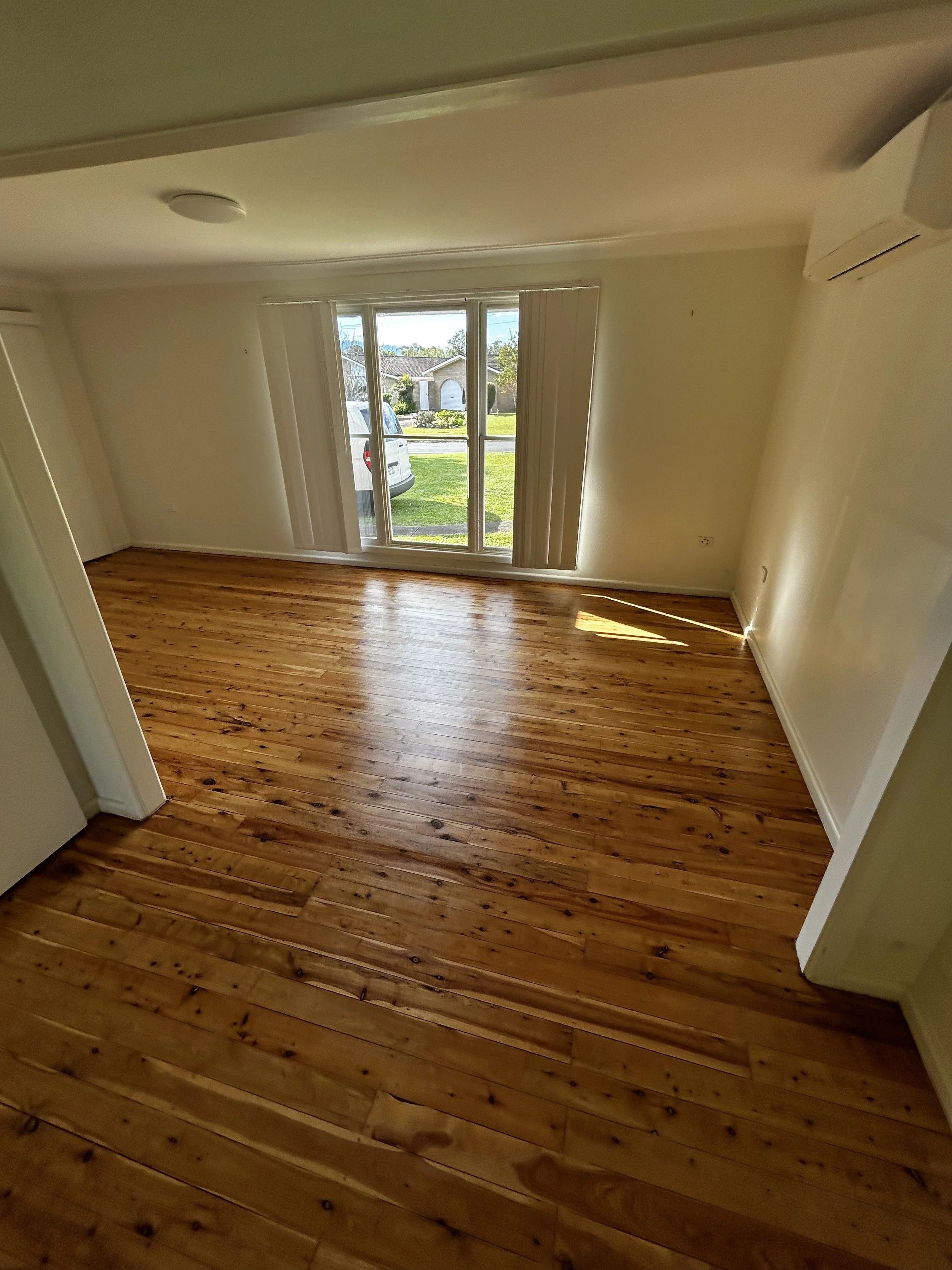 Refinished hardwood timber floors in Shoalhaven living room, floor sanding results