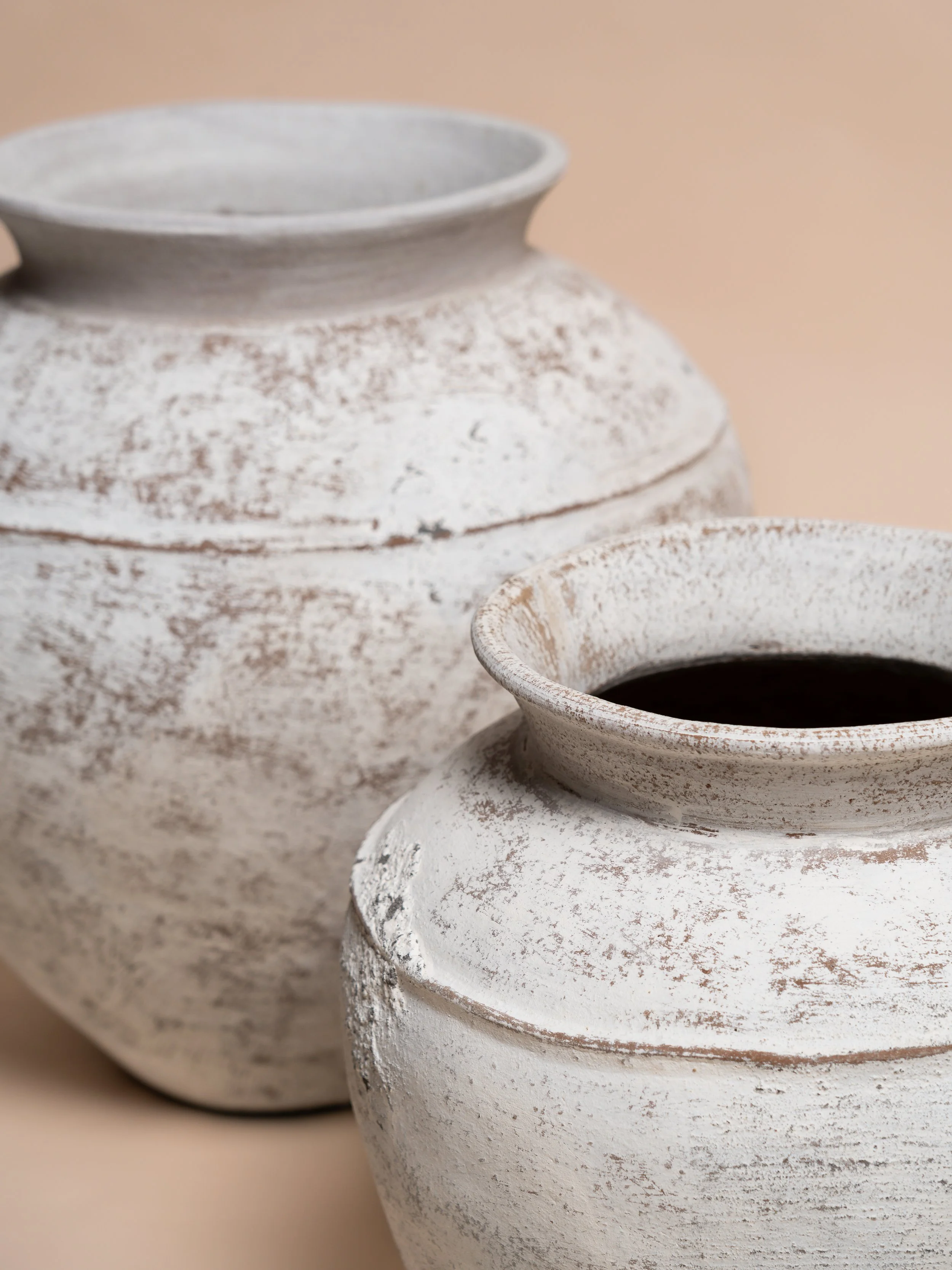 Close‑up detail of the white Positano pot — wedding décor hire