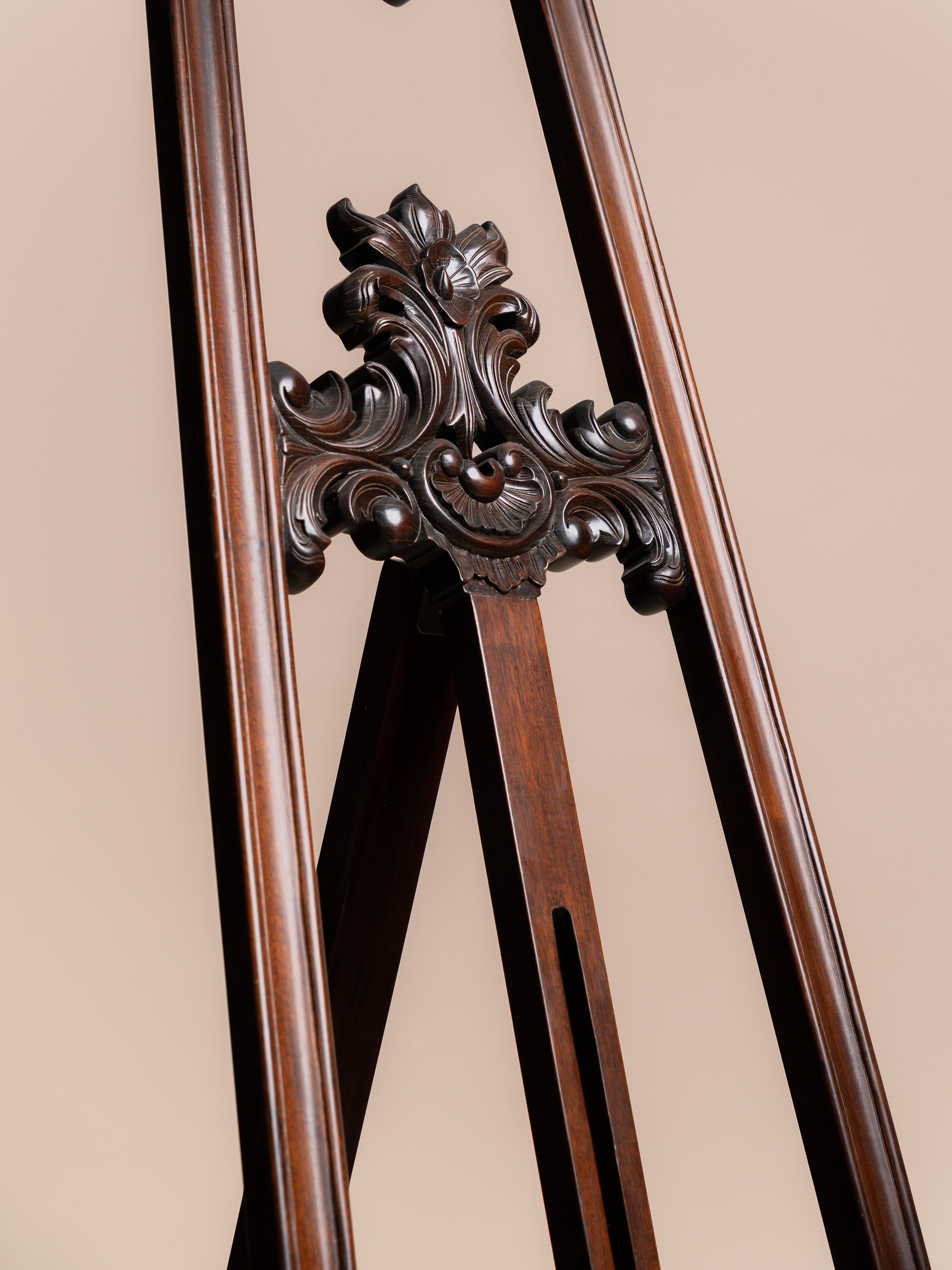 Close‑up detail of walnut wooden easel — wedding signage hire