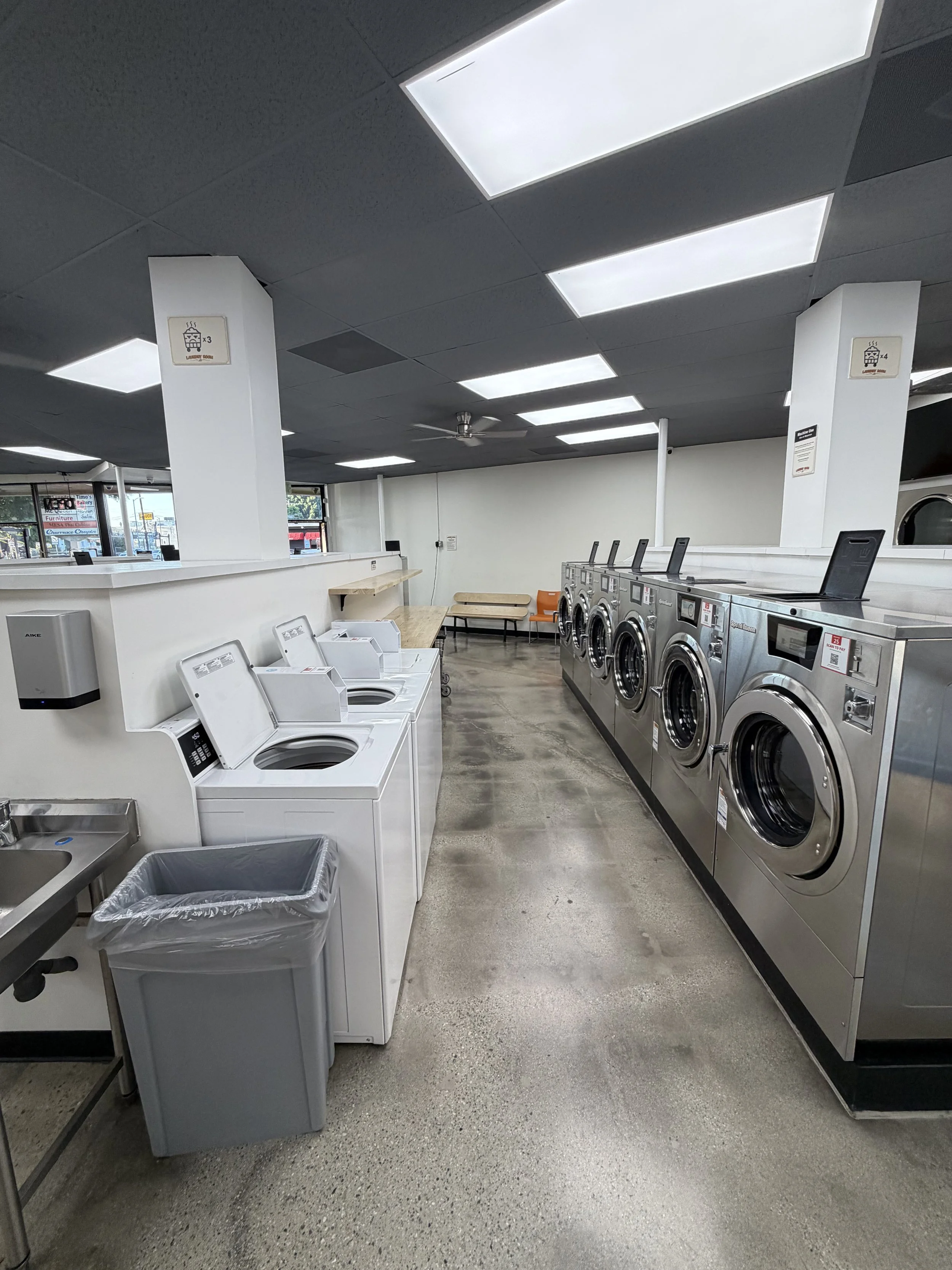 Top-load and front-load Speed Queen washers at Laundry Room LA self-service laundromat