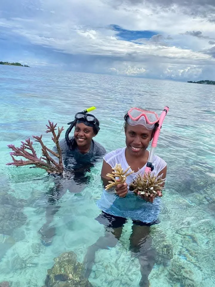 Miriam S and Jasmine R at Tetepare carryout broodstock harvesting from reefs around Gizo for coral replanting at Nusatupe. Mirriam S: Year 2023