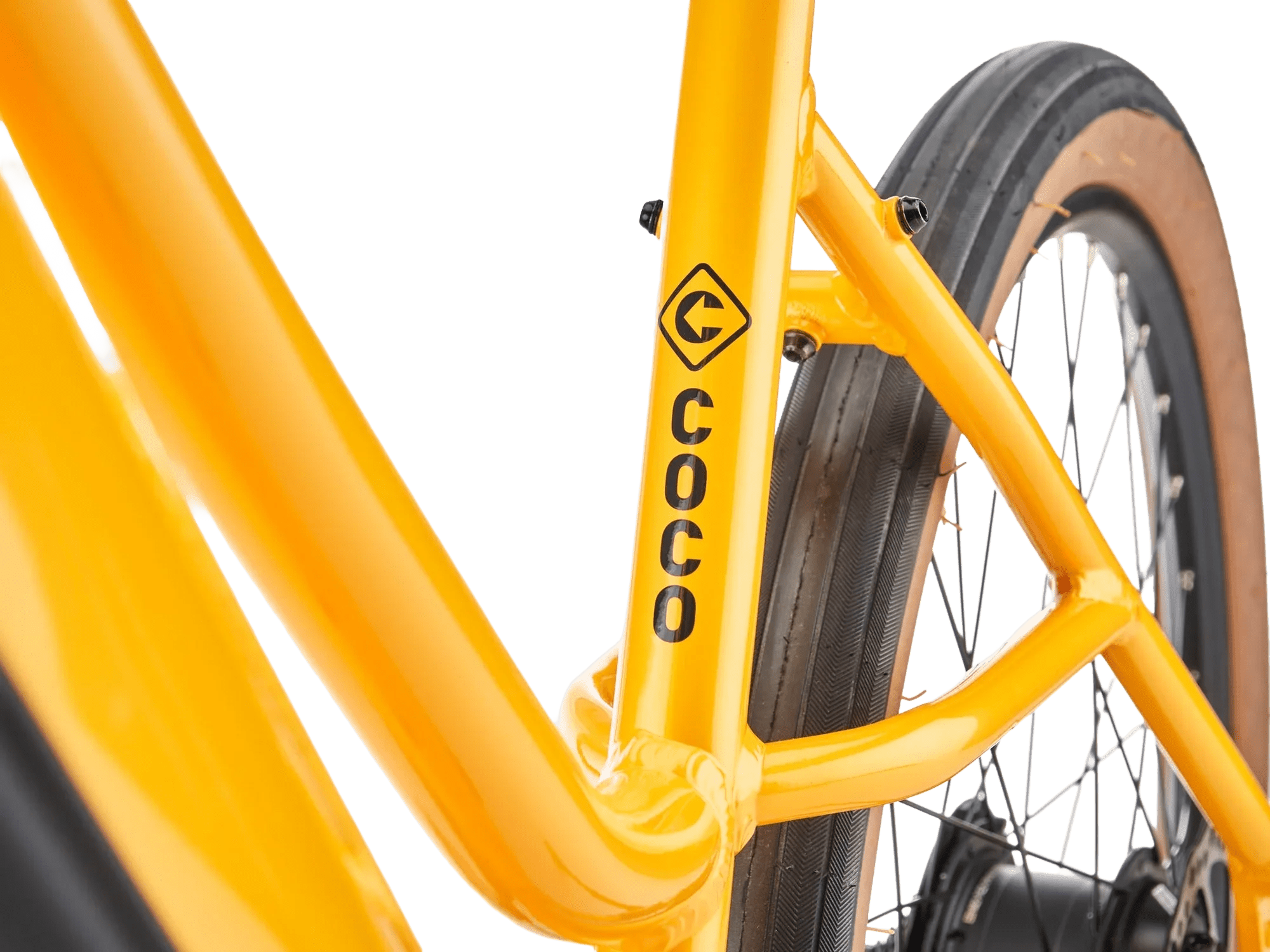 Close-up of a bright yellow bicycle frame and rear wheel with a black tire and metal spokes.