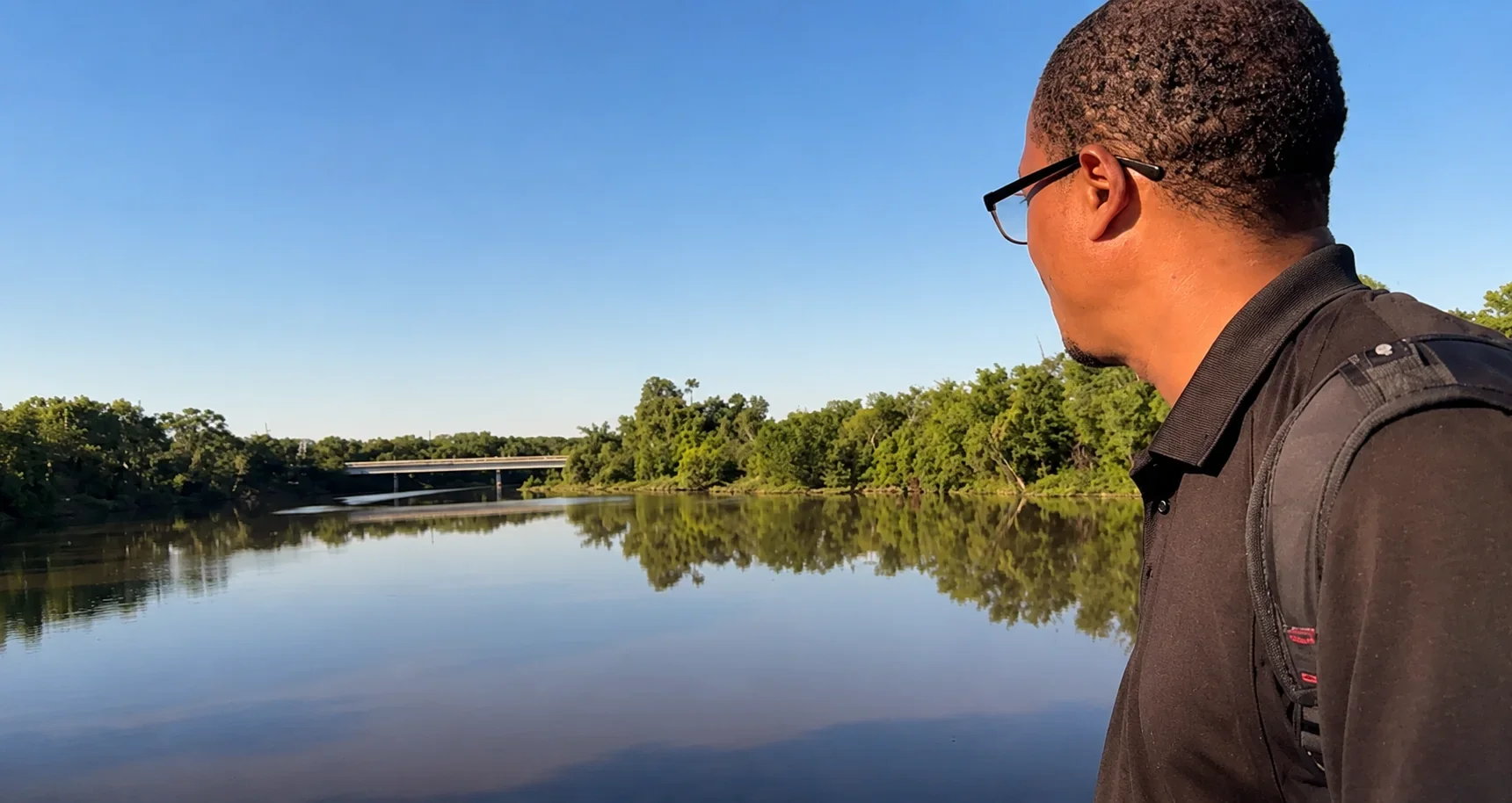 Twan Woods observing the Anacostia River from Kingman Island during field documentation.