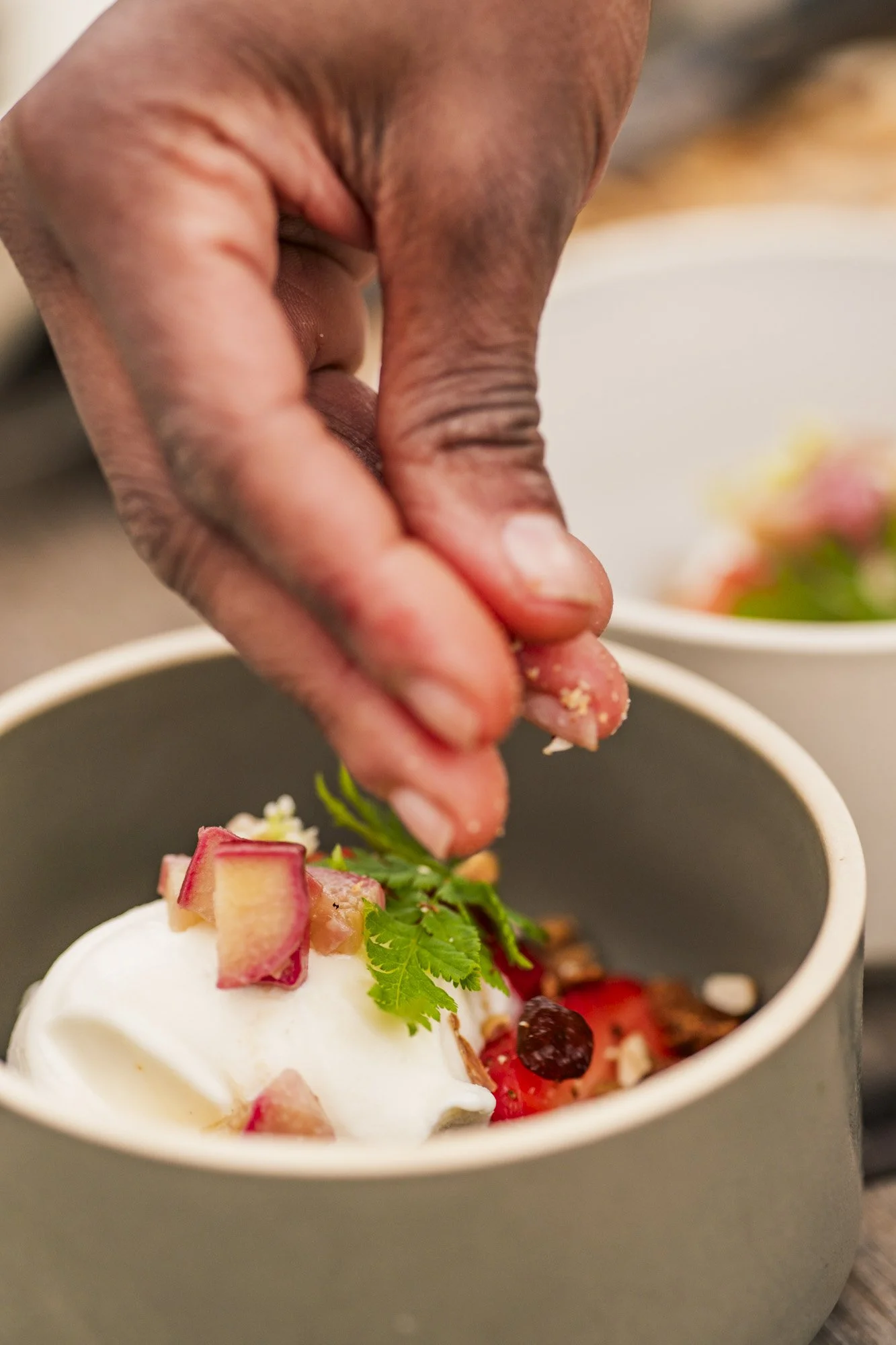 Michel Gonzaga offers a tasting with strawberries