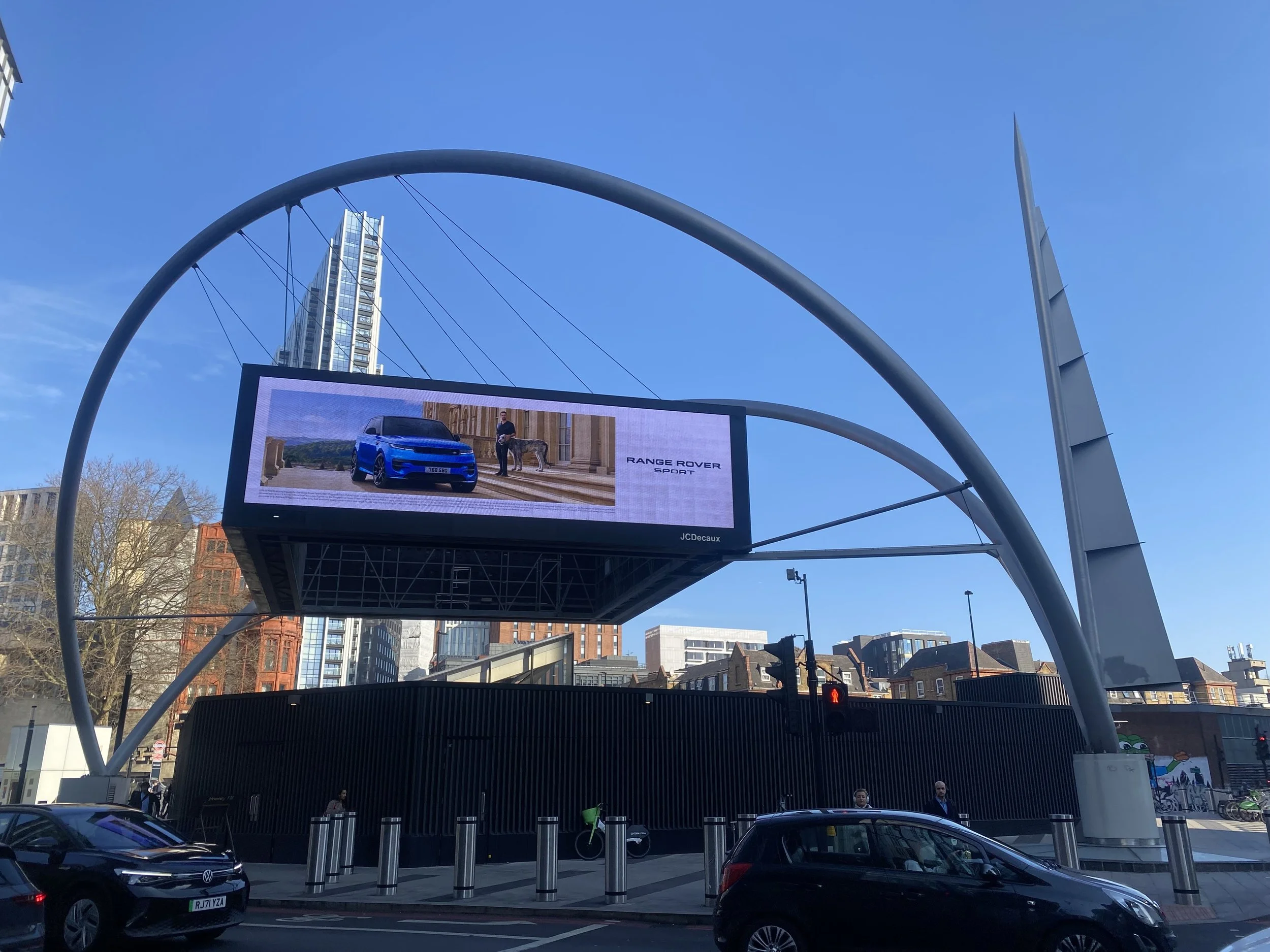 Digital billboard advertising Range Rover Sport starring Theo James at Old Street roundabout