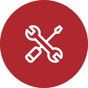 Icono de herramientas que incluye una llave y un destornillador, sobre un fondo rojo.