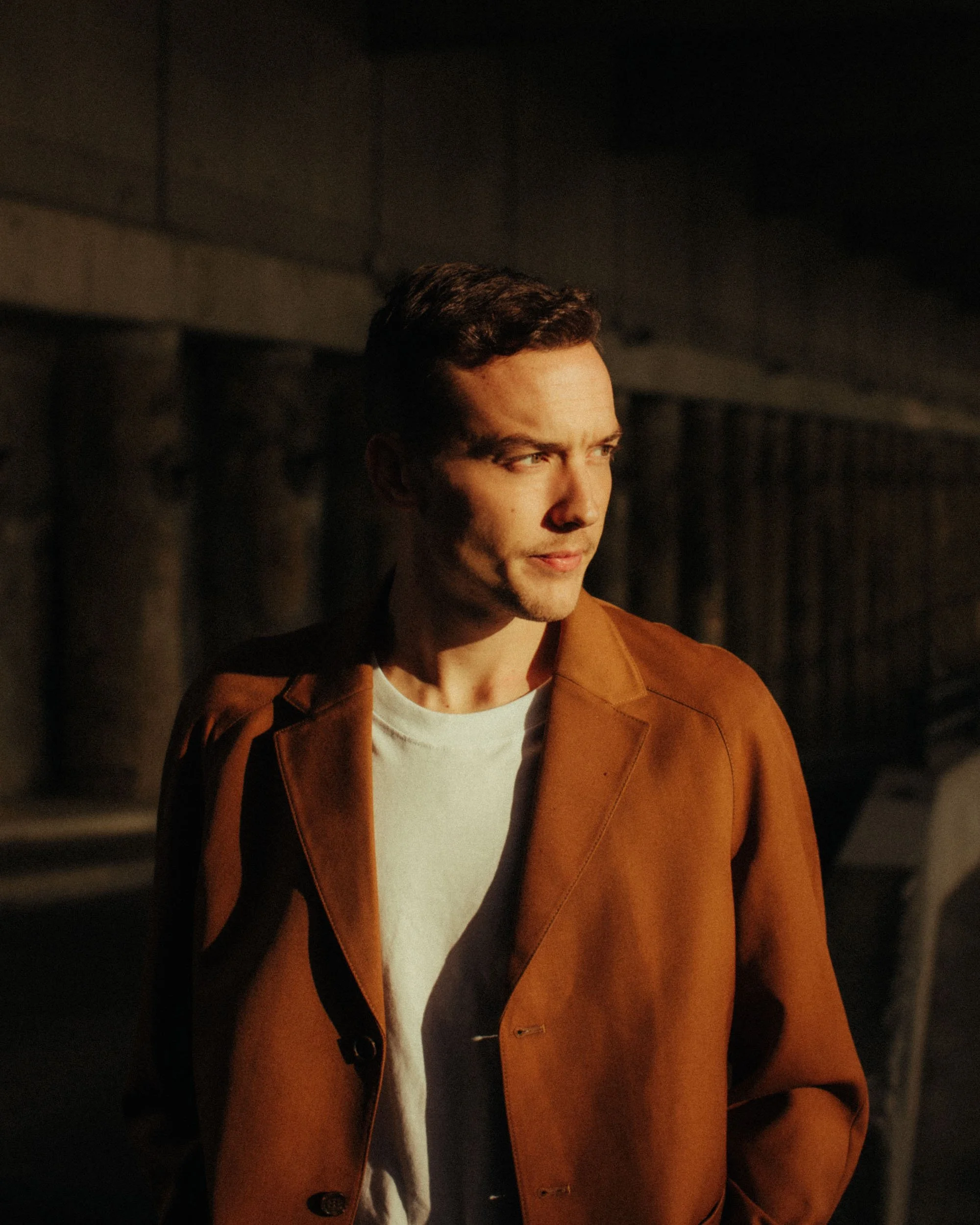 Street portrait of Ben Böhmer in warm evening light, photographed by Dan Medhurst in Berlin.