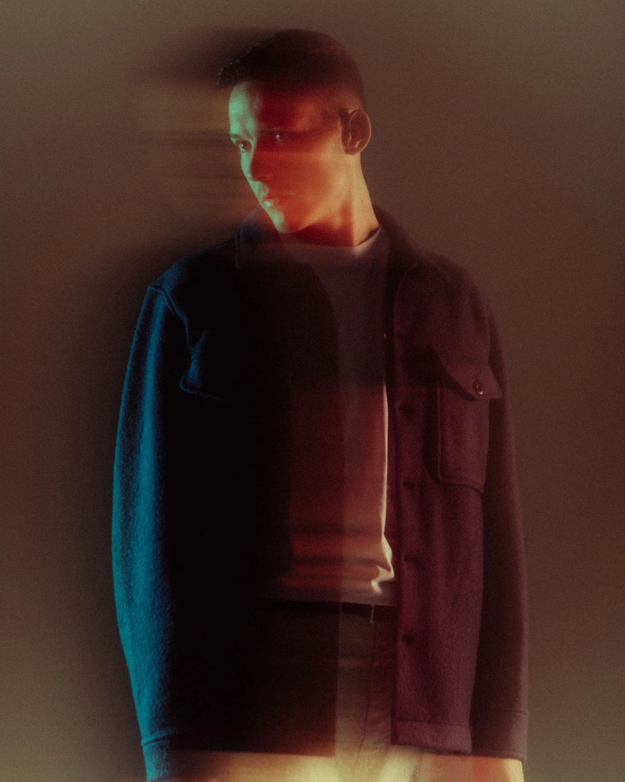 Atmospheric studio portrait of Ben Böhmer with coloured light, photographed by Dan Medhurst in Berlin.