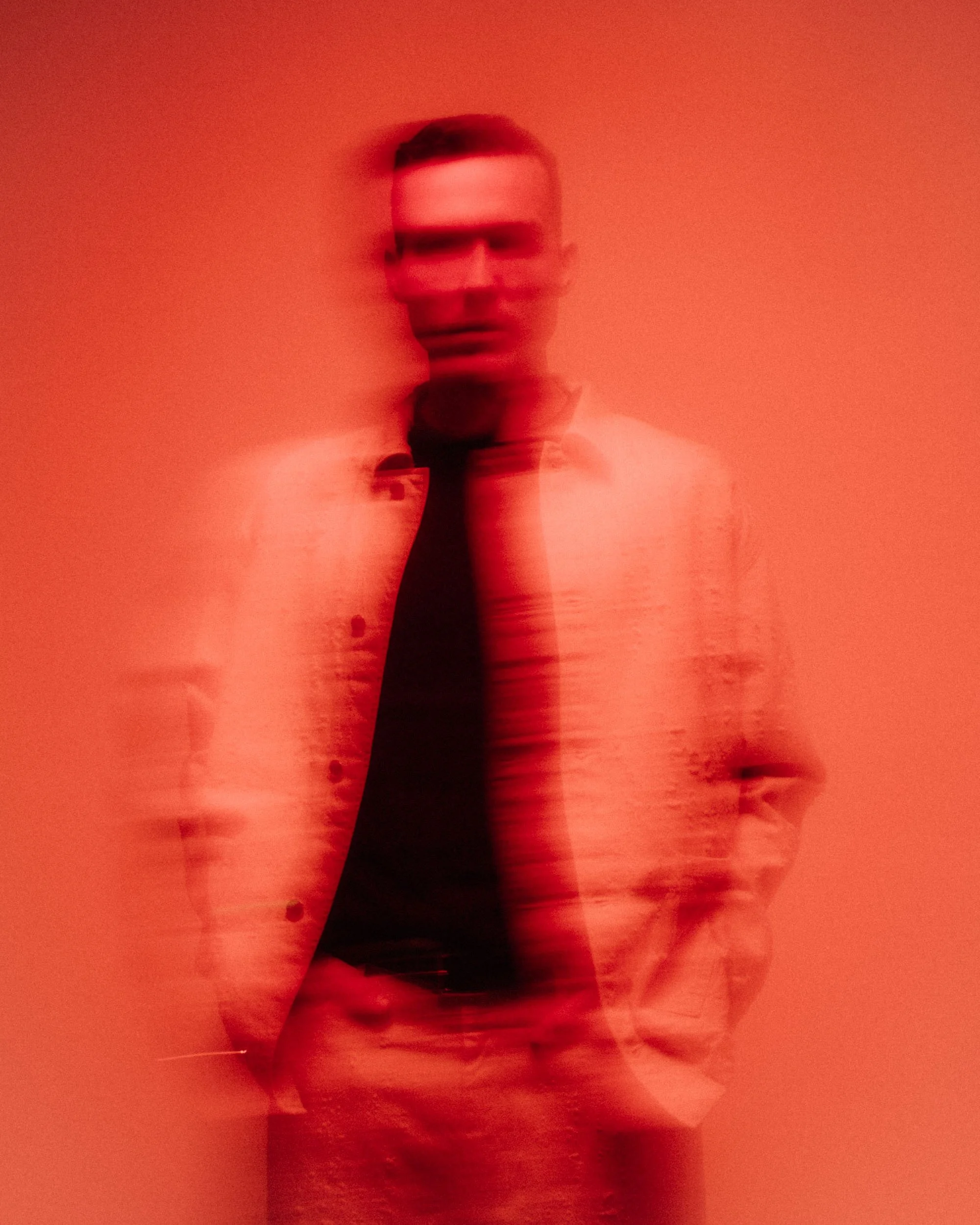Experimental red portrait of Ben Böhmer photographed by Dan Medhurst in Berlin.