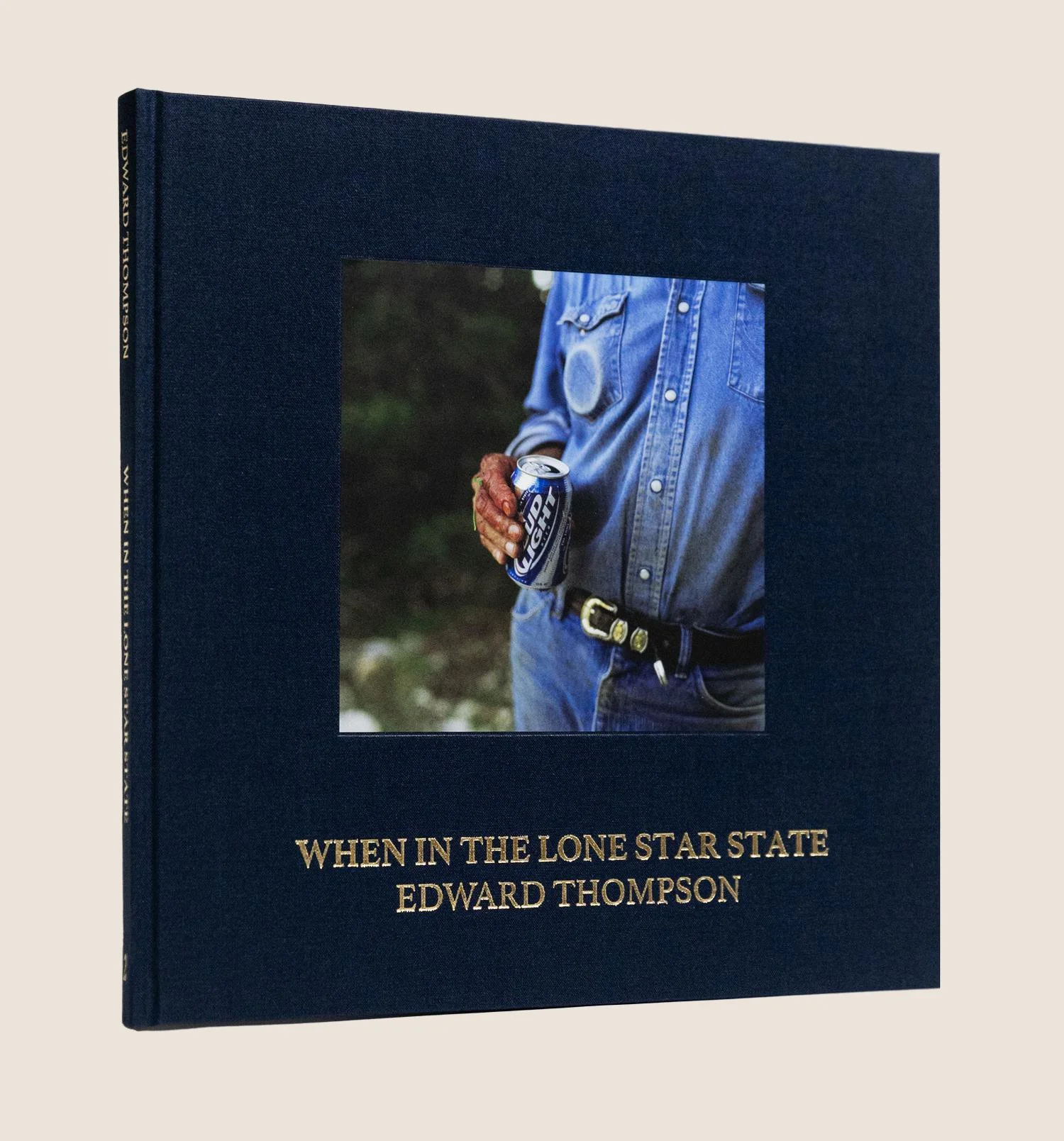 A book cover titled "When in the Lone Star State" by Edward Thompson features a person in a denim shirt holding a can of beer or soda with a blurred outdoor background.