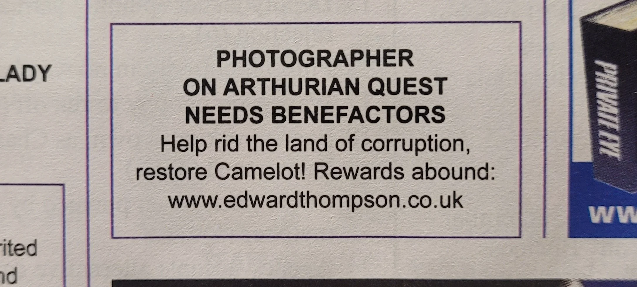 Close-up of a printed donation request advocating for a land restoration project with a link to a website.
