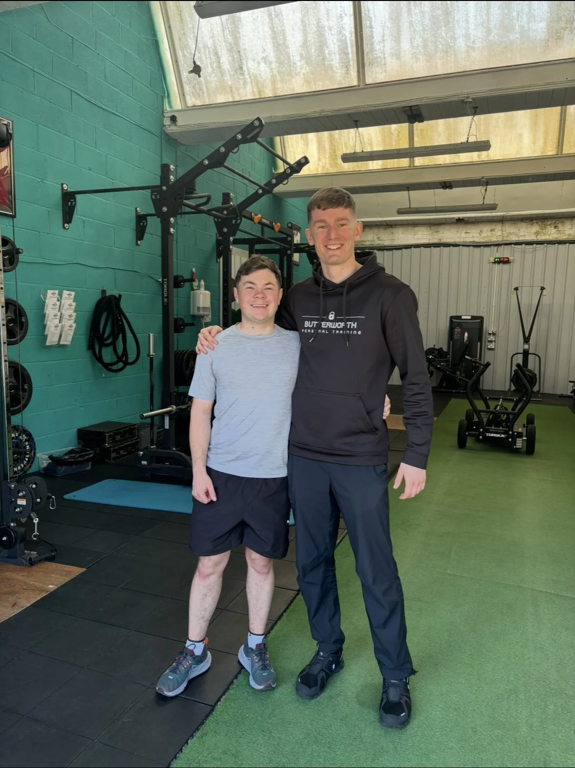 Josh Butterworth, Burnley PT pictured with client for client testimonial.