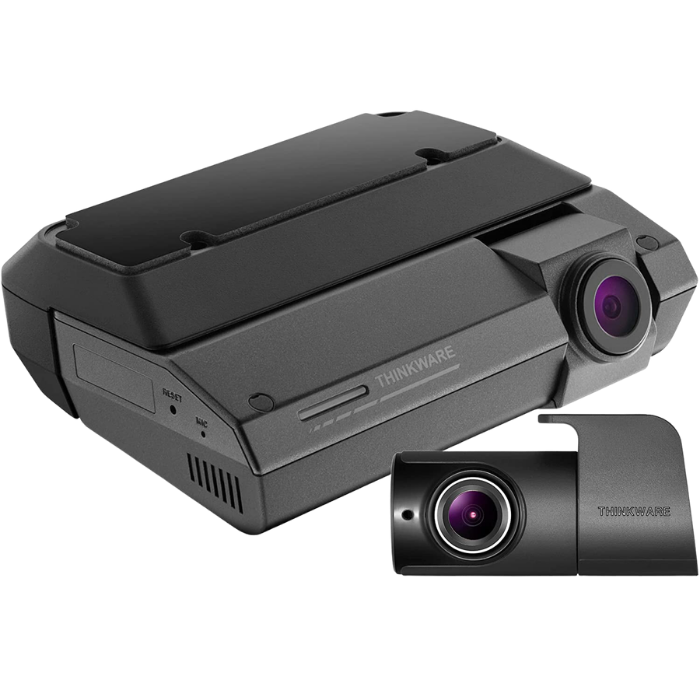 A Thinkware dashcam with a main camera unit and a separate smaller camera, both black with lens elements, used for vehicle recording.