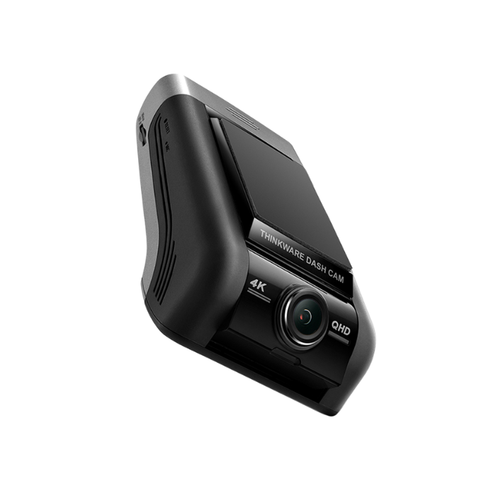 A black dashboard camera with a lens and a screen, labeled "Thinkware Dash Cam" and "4K QHD".