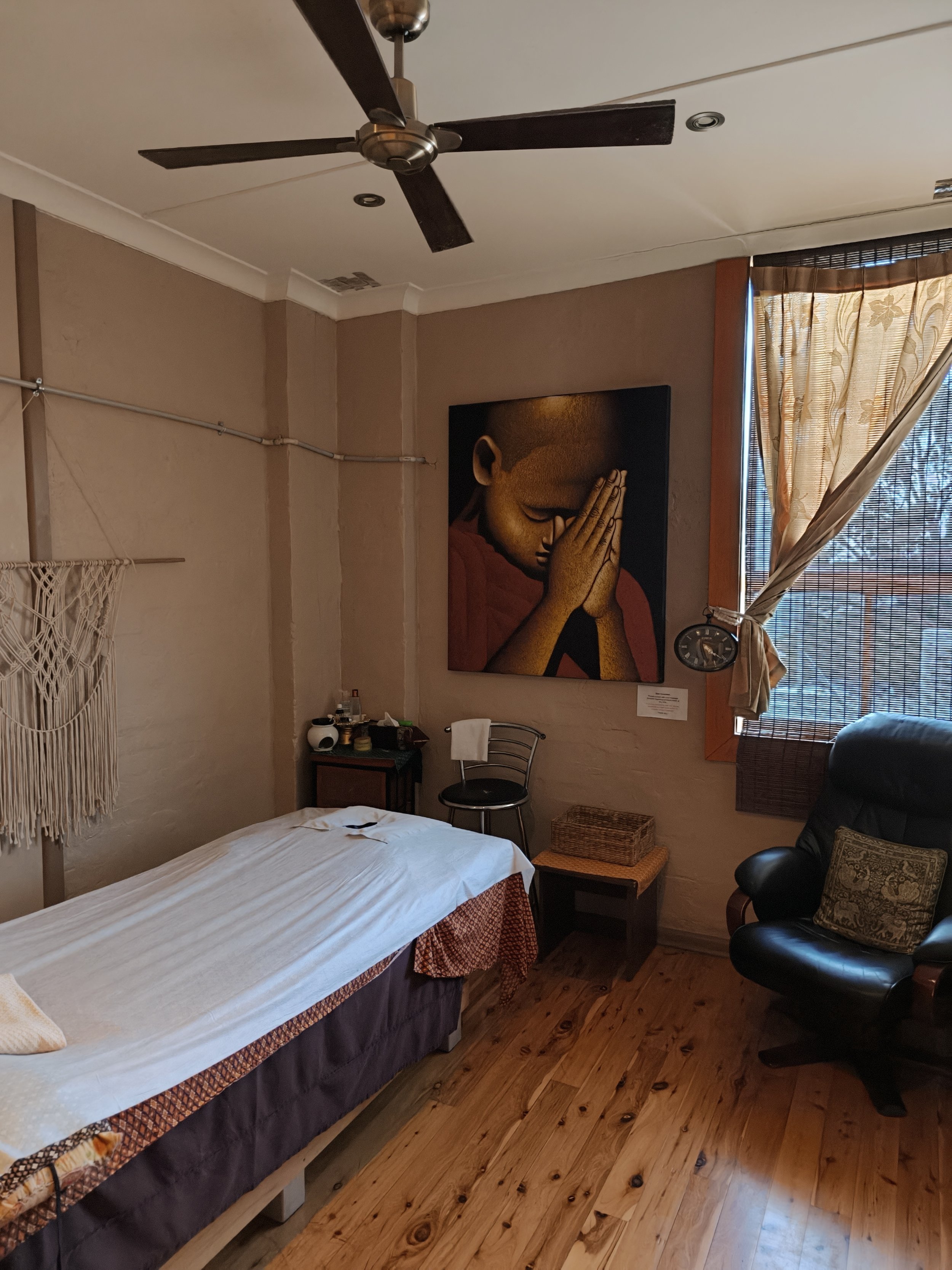 Room 3 is situated towards the back with a single massage bed.