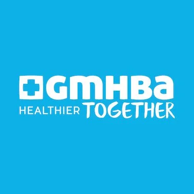 White GMHBA text on a blue background.