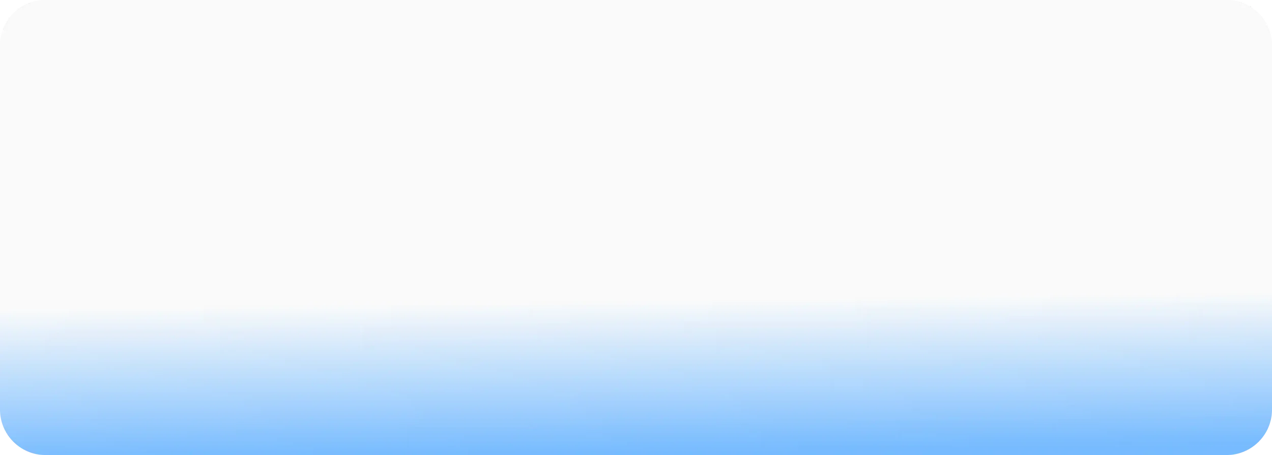 Blurred background with gradient shades of white, gray, and blue.