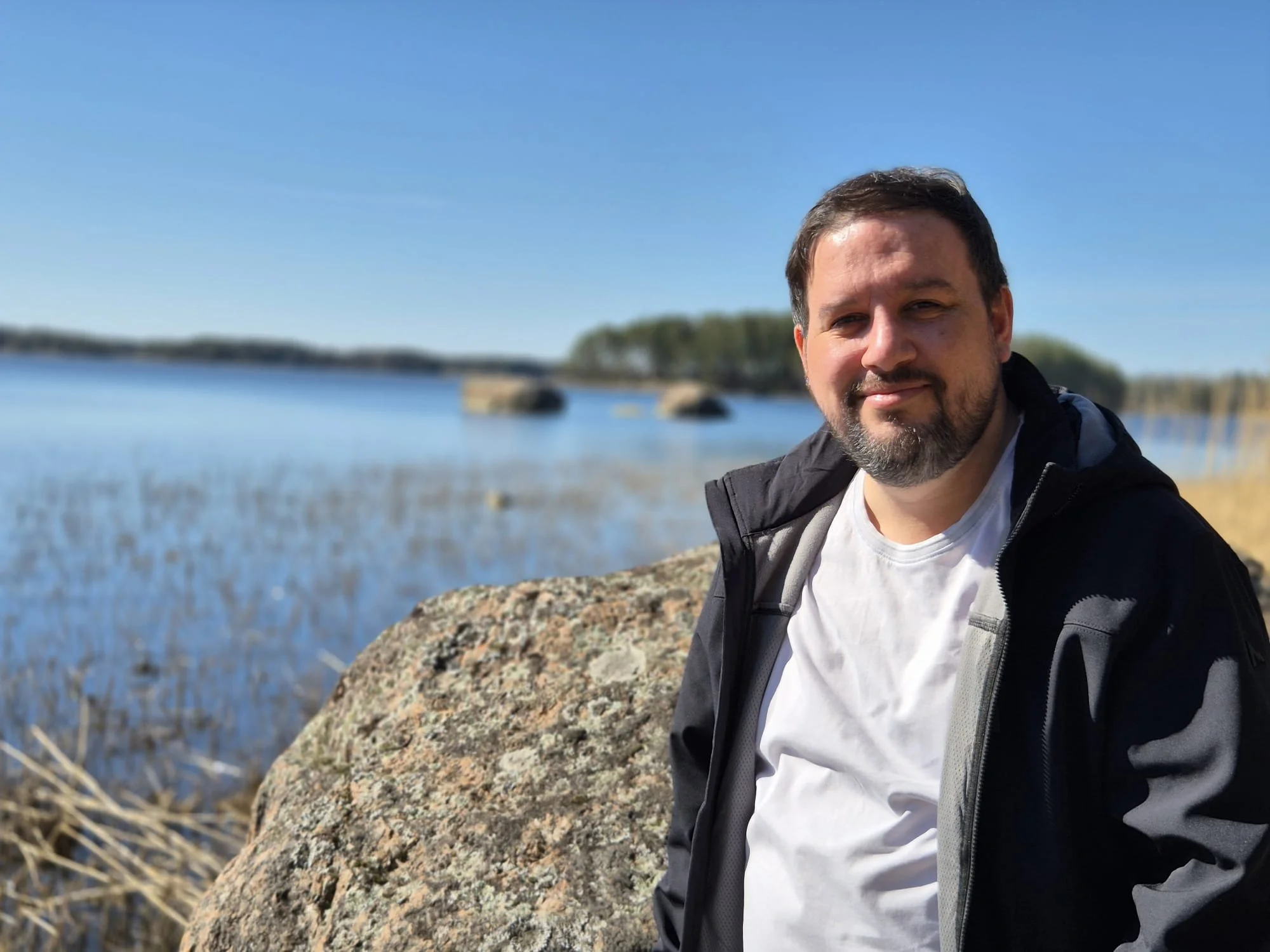 Nordic Travel Table founder Mike Marolia in front of Finnish lakeland near Kotka in Finland