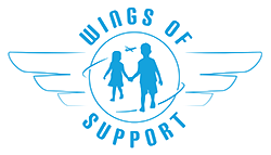 Logo with a circular design featuring two children holding hands inside a wings emblem, with the text 'Wings of Support' surrounding the image.