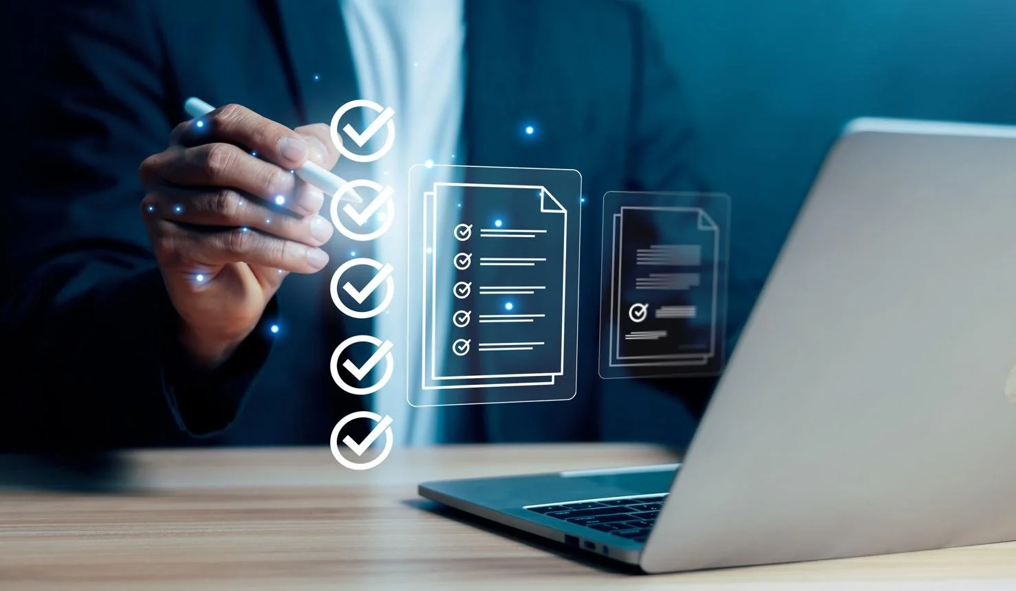Business person in a suit using a transparent digital checklist with checkmarks on a laptop.