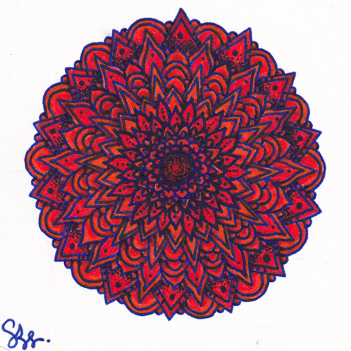 A colorful intricate mandala design with red, purple, and black details on white paper.