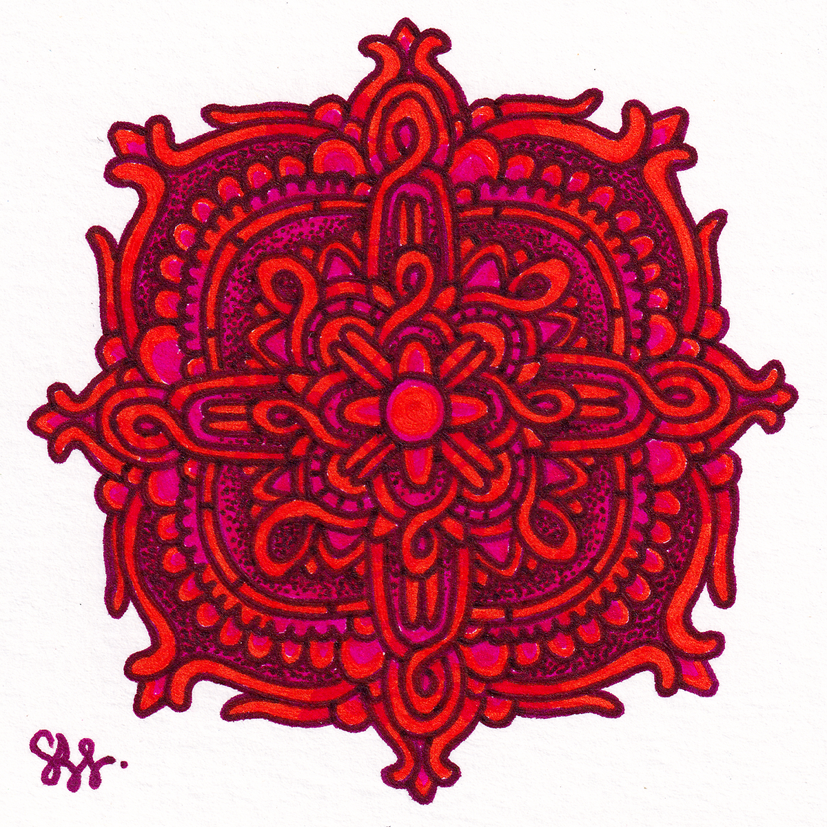 A red and pink intricate mandala design with symmetrical patterns on a white background.
