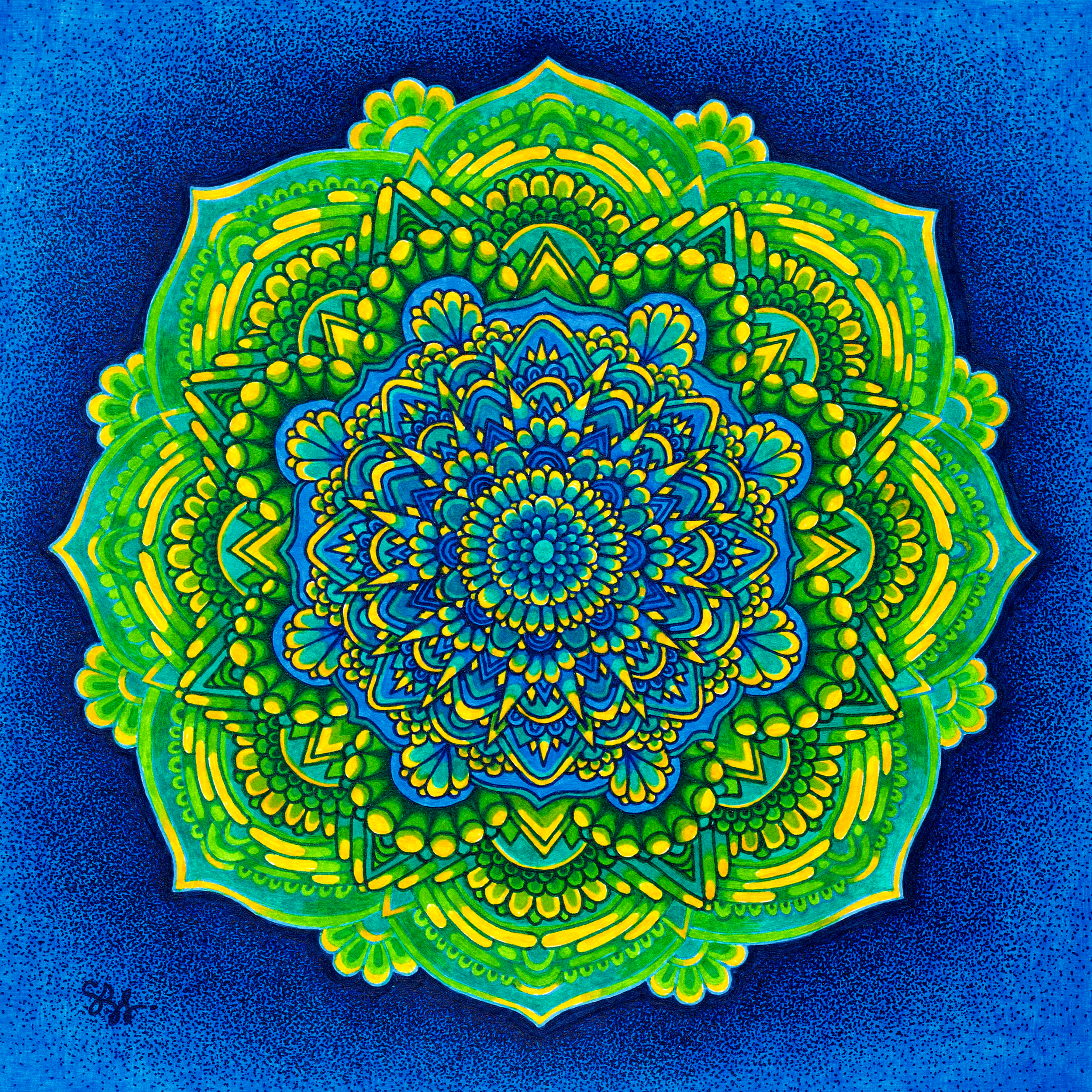 A vibrant, colorful mandala with intricate patterns in yellow, green, blue, and teal, set against a textured deep blue background.