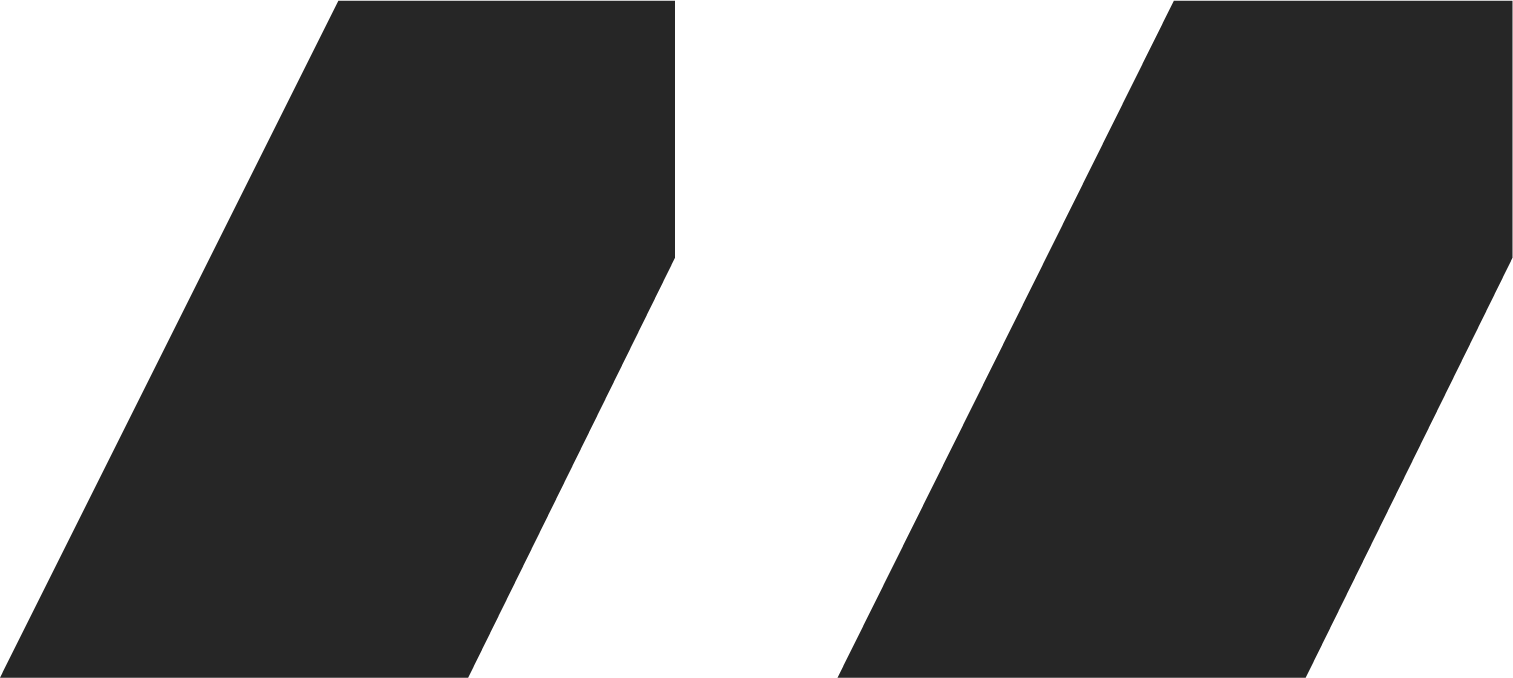 The image shows black and dark gray diagonal stripes against a black background.