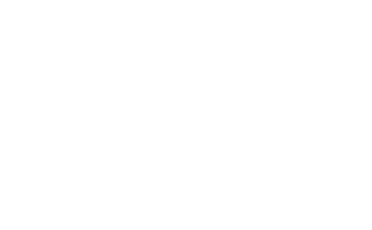 Logo for Johnson & Wilson Real Estate Company with a decorative laurel wreath, initials J & W, and the year 2000.