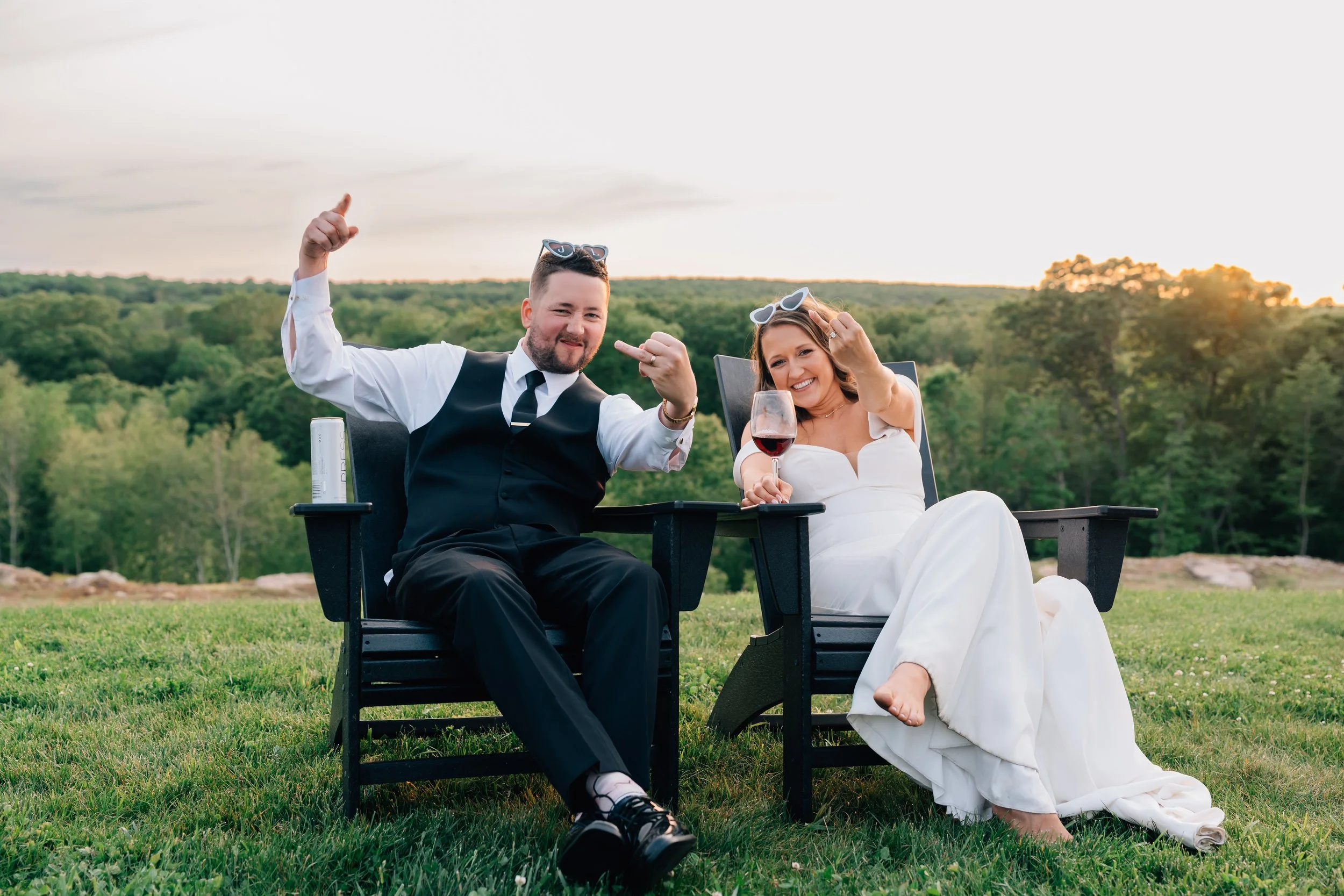 Couple smiles and shows rings to the photographer as they elope in Juneau Alaska