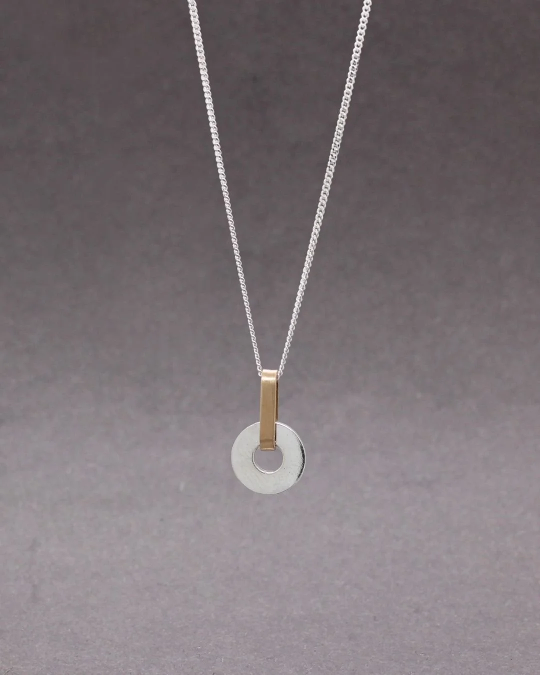 Disc pendant silver, guld 3950kr