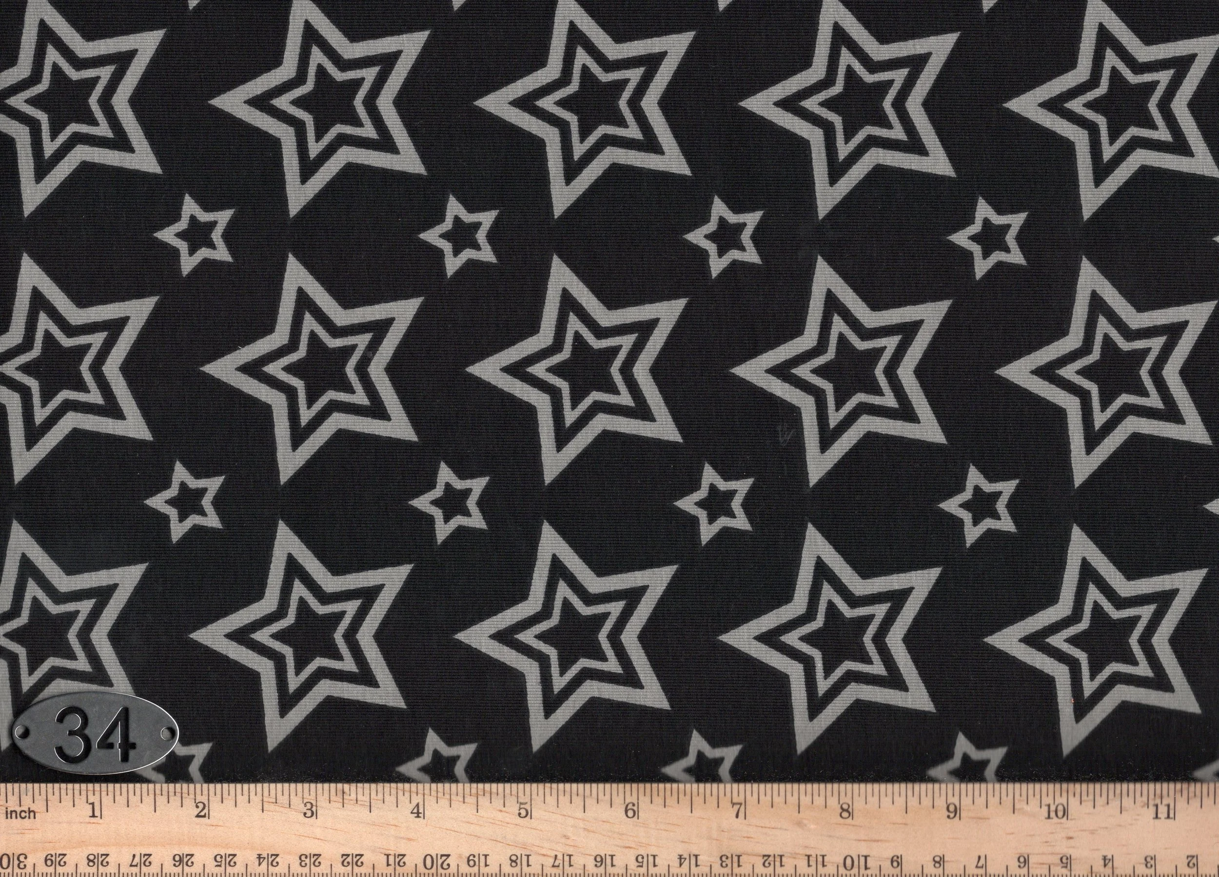 #034 Grey Stars on black Cotton Jersey slight Stretch Apparel Fabric