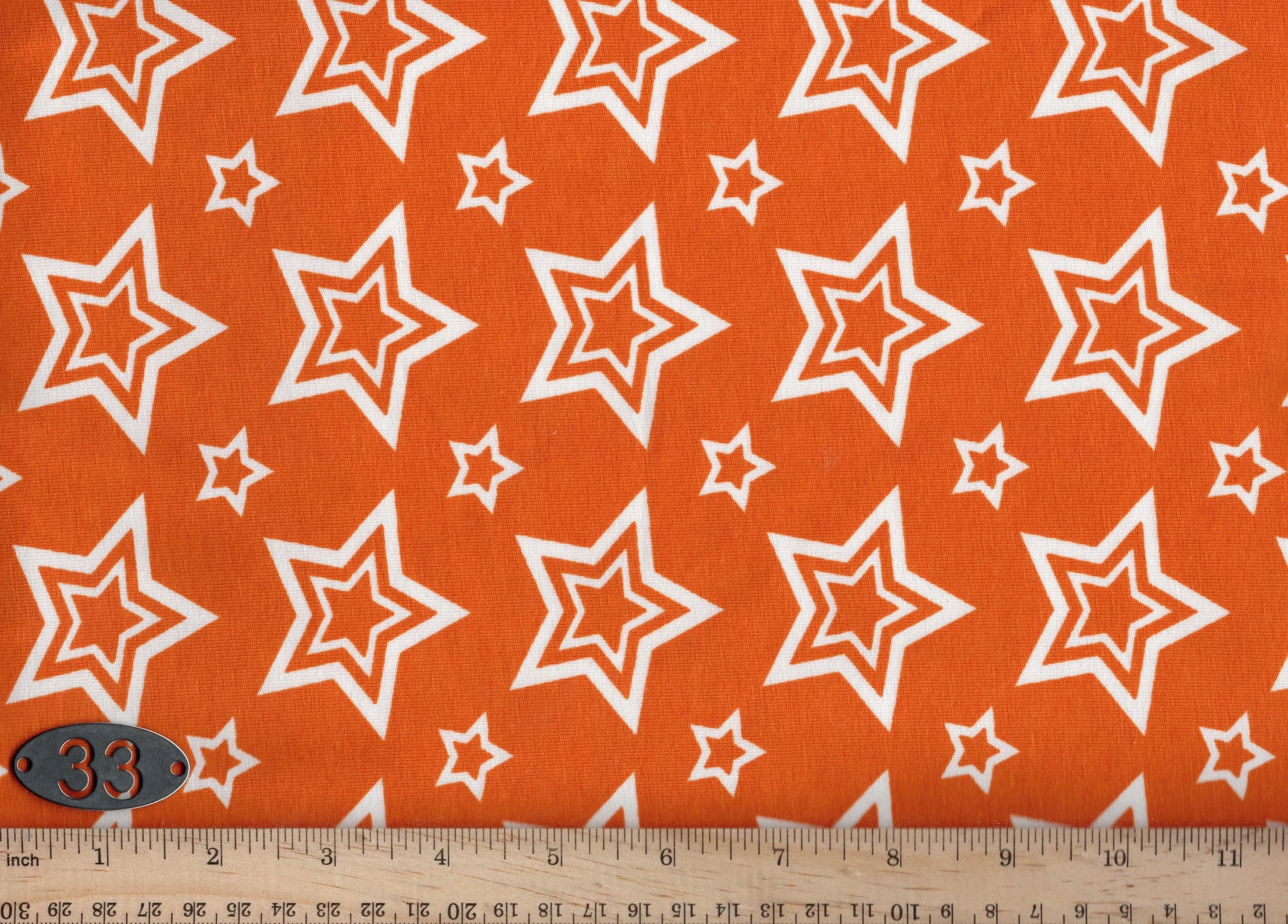 #043 White Stars on Orange Four-way Stretch Cotton Jersey Apparel Fabric