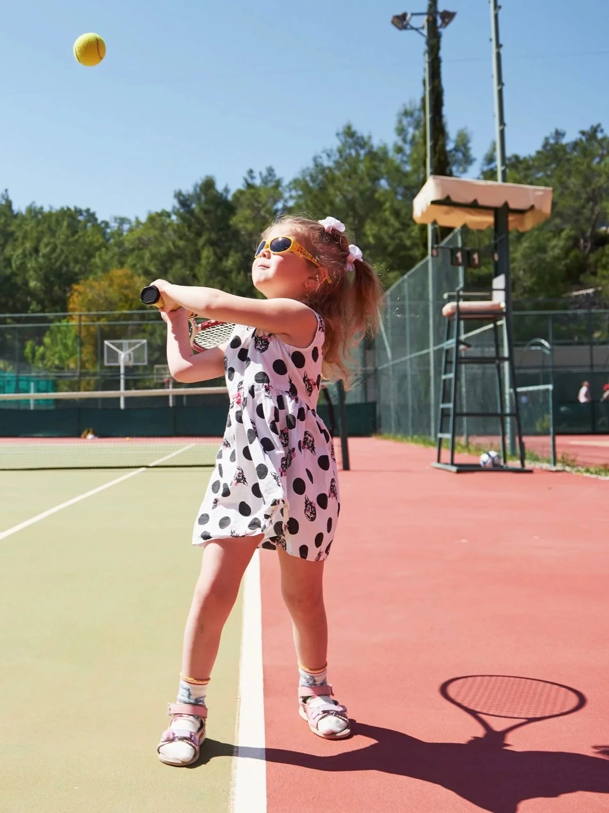 happy-little-girl-playing-tennis-summer-sport.jpg