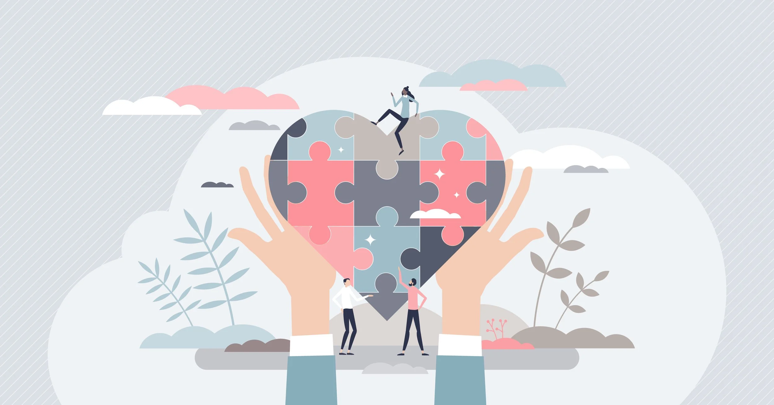 Jigsaw puzzle heart held by large hands with smaller people around the outside of the heart.