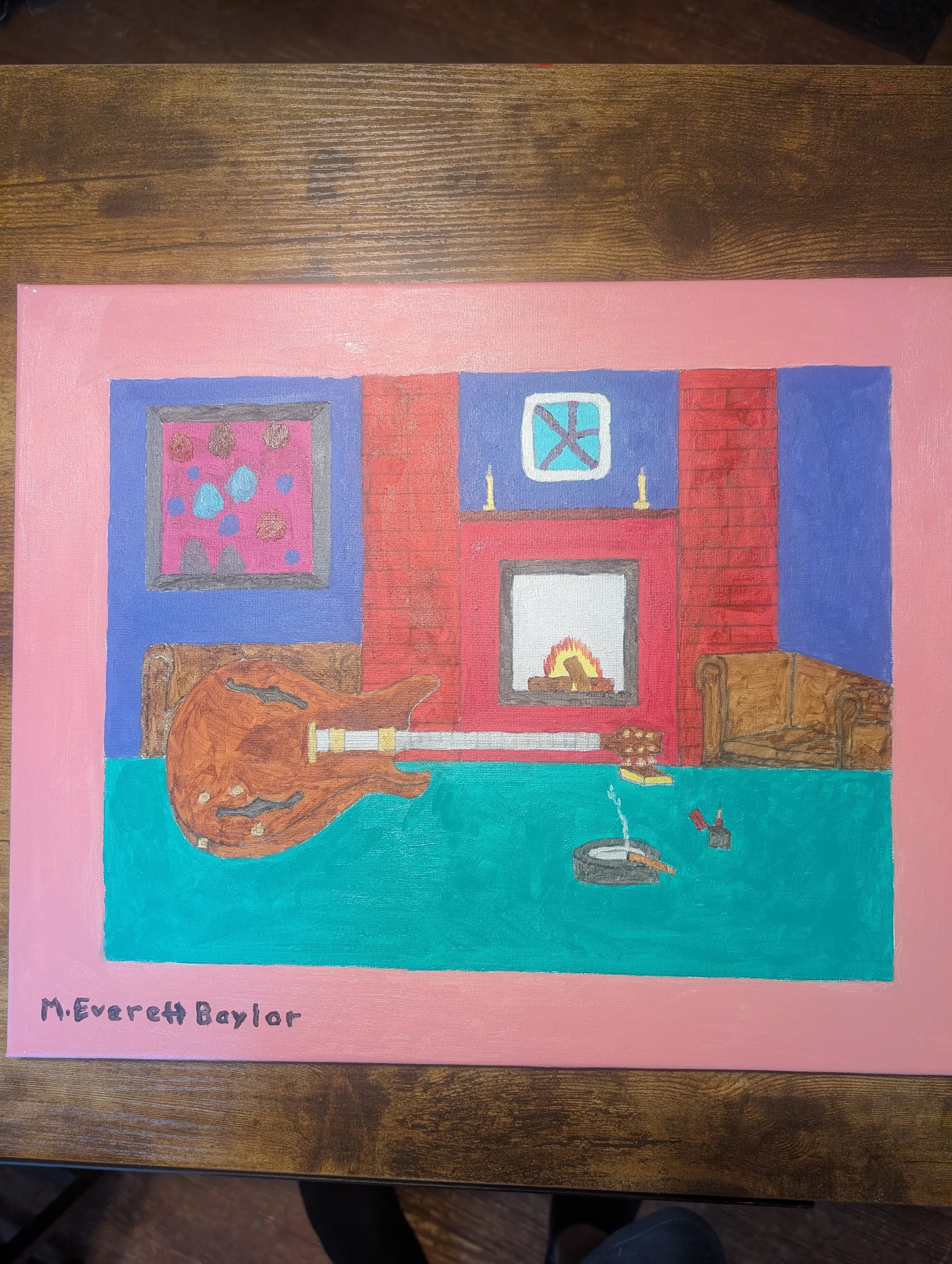 Guitar by the Fire is a painting depicting a guitar resting on a table in front of a fire burning in the fireplace. 