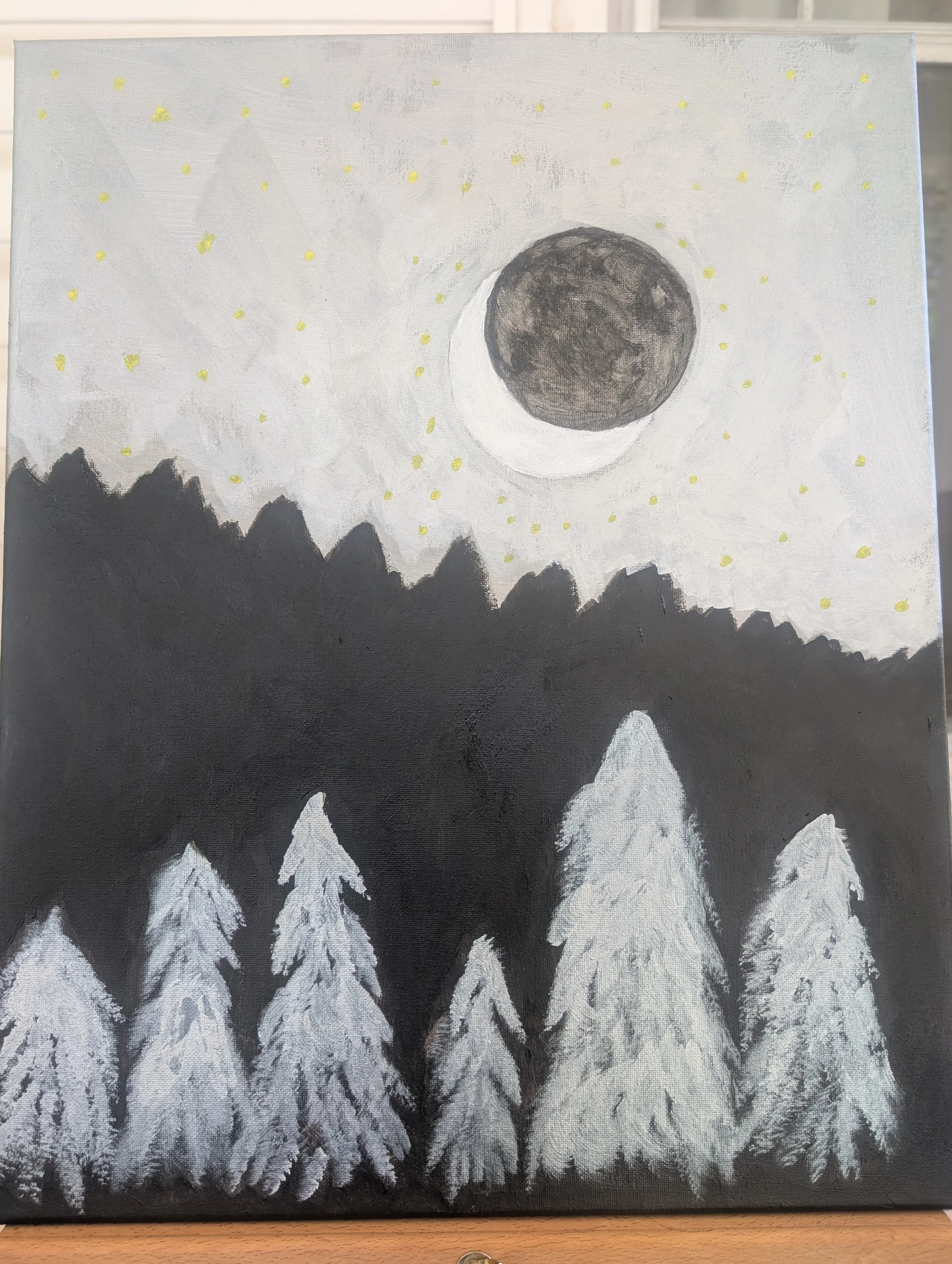 Luner Eclipse – 16x20 Acrylic - is a painting depicting a special event at night as the sun passes behind the   putting it to bed. 