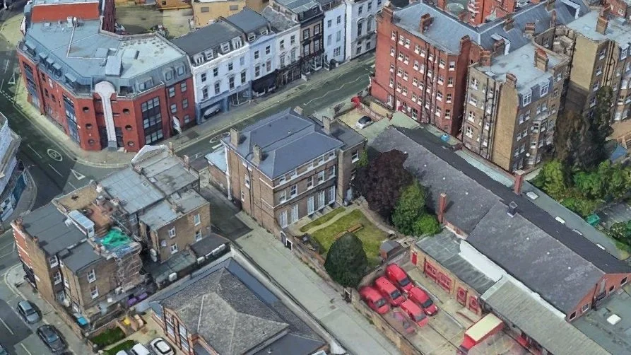 An aerial bird's-eye view photograph capturing the urban context and rear garden space of the site at 639 Fulham Road, London.