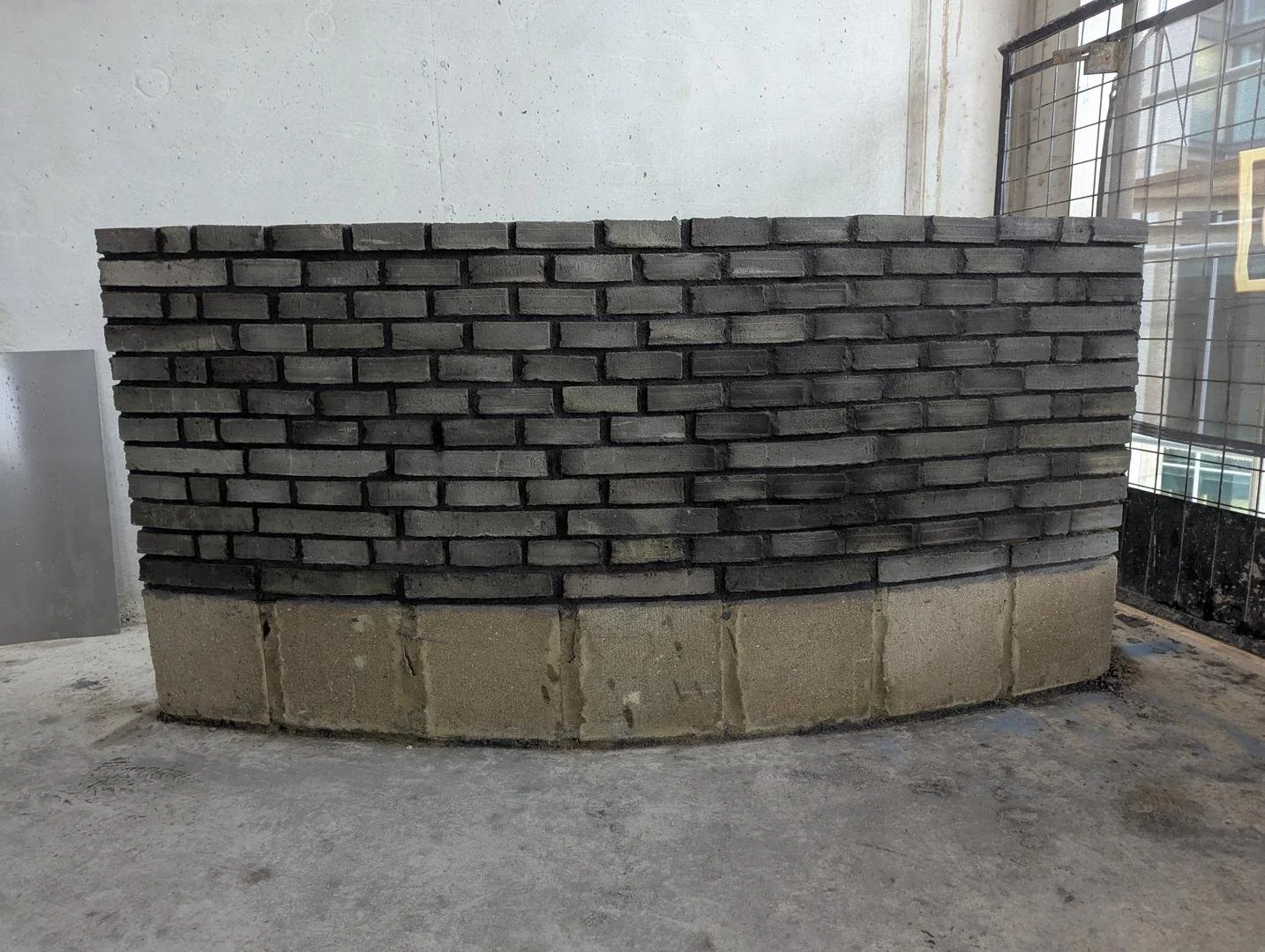Building brick samples on site for Melior Place curved walls.