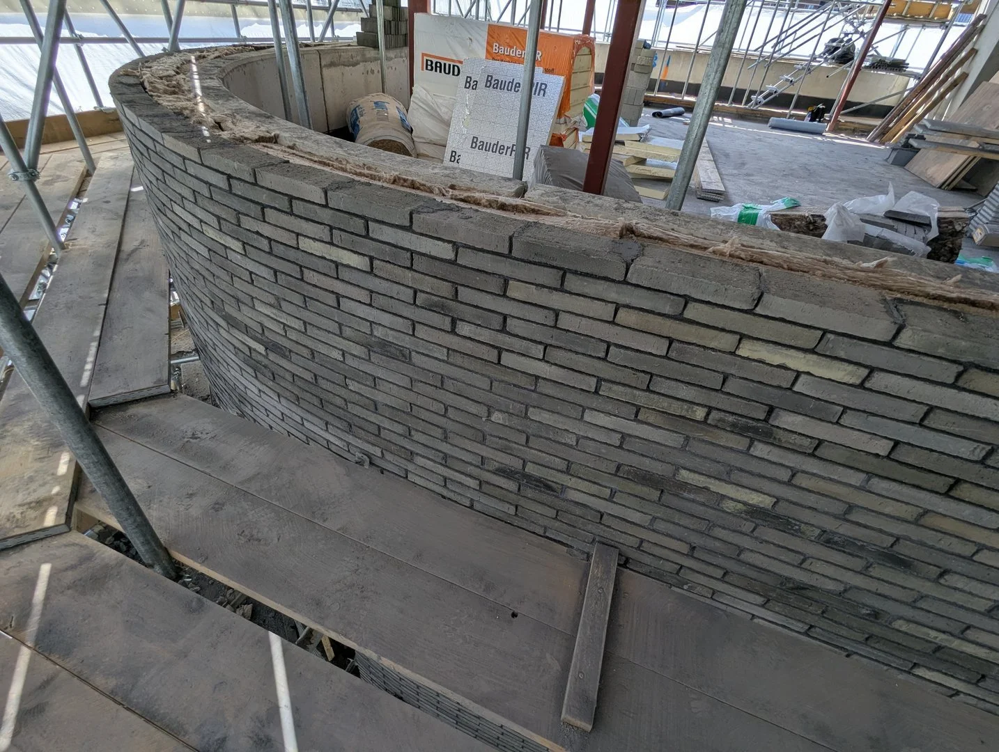 Building brick samples on site for Melior Place curved walls.