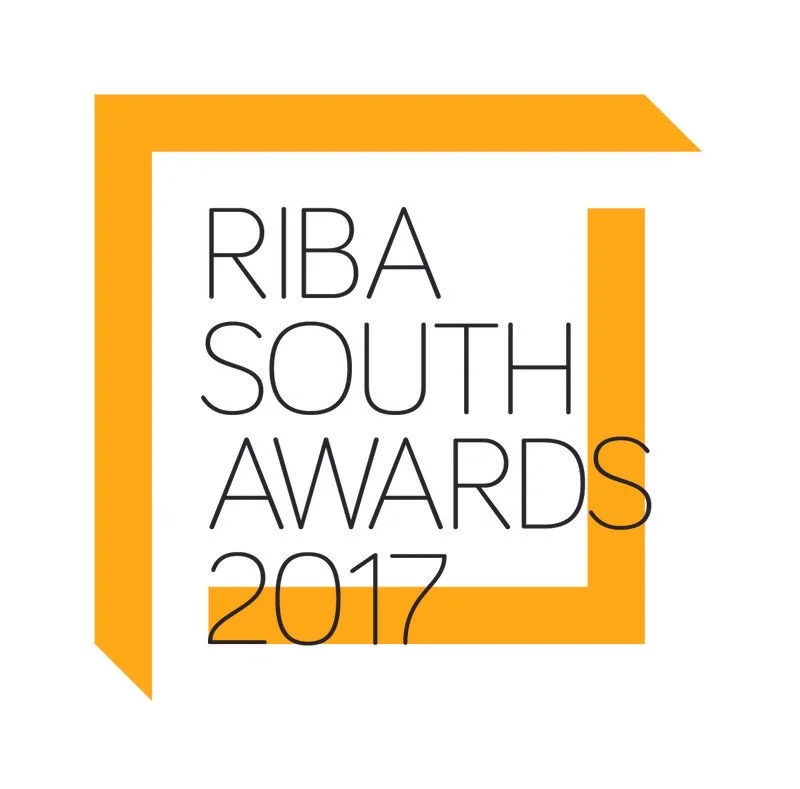 Logo for the RIBA South Awards 2017 featuring a stylized yellow square outline with black text inside.