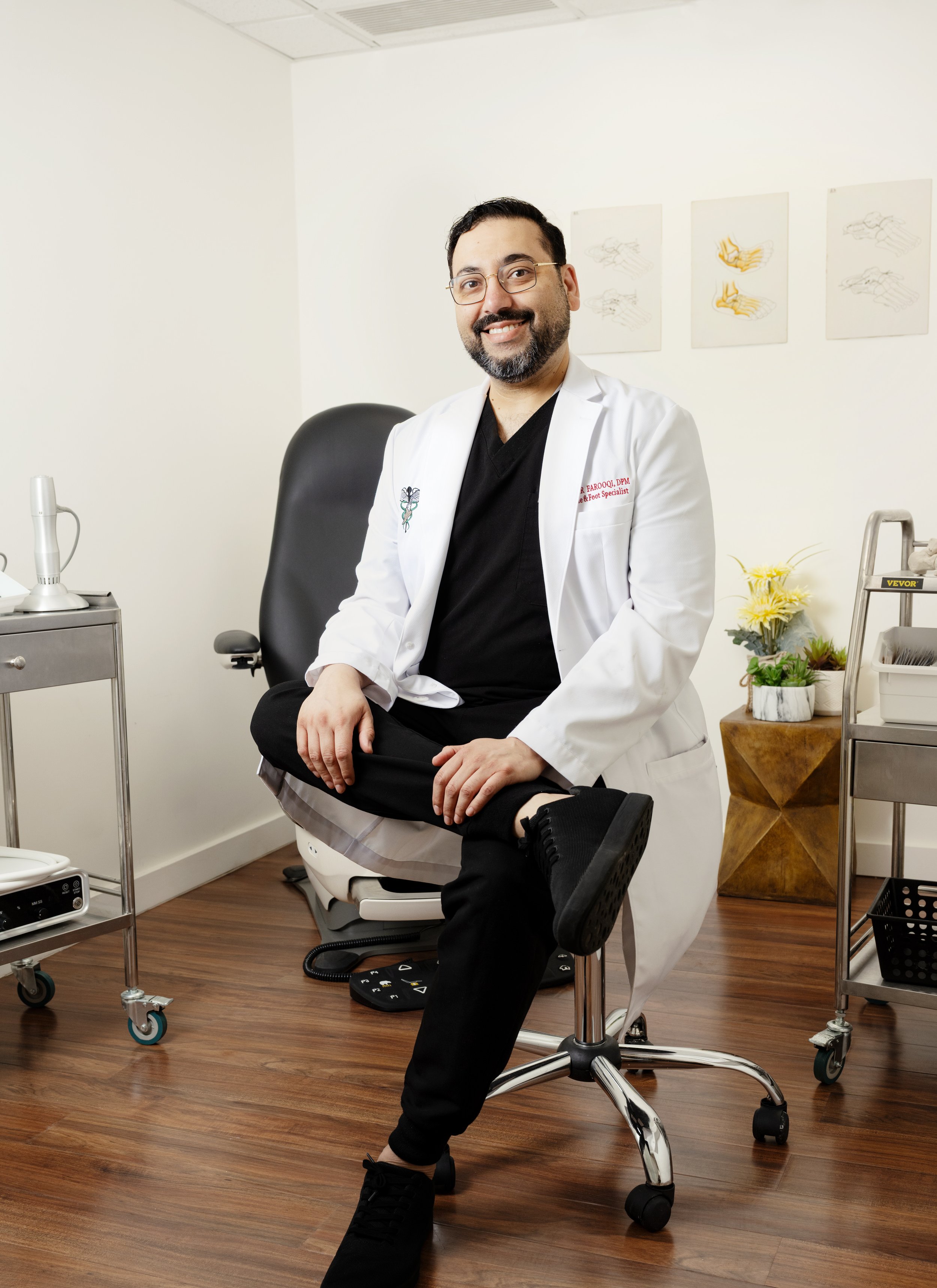 Pakistani Indian South Asian male podiatrist doctor NYC New York City Midtown Manhattan Queens LIC Long Island City Urdu English Hindi Arabic violinist gay LGBT queer trans friendly surgeon bunion plantar fasciitis heel pain fungal toenail ingrowing