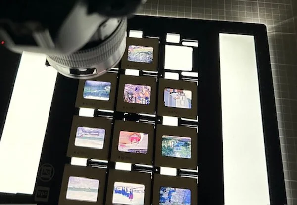Reviewing a collection of 35mm slides.