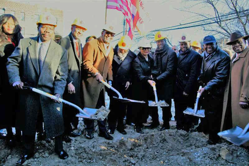 Elected officials, clergy and community leaders break ground for the Bishop Philius and Helene Nicolas Senior Residence Project.