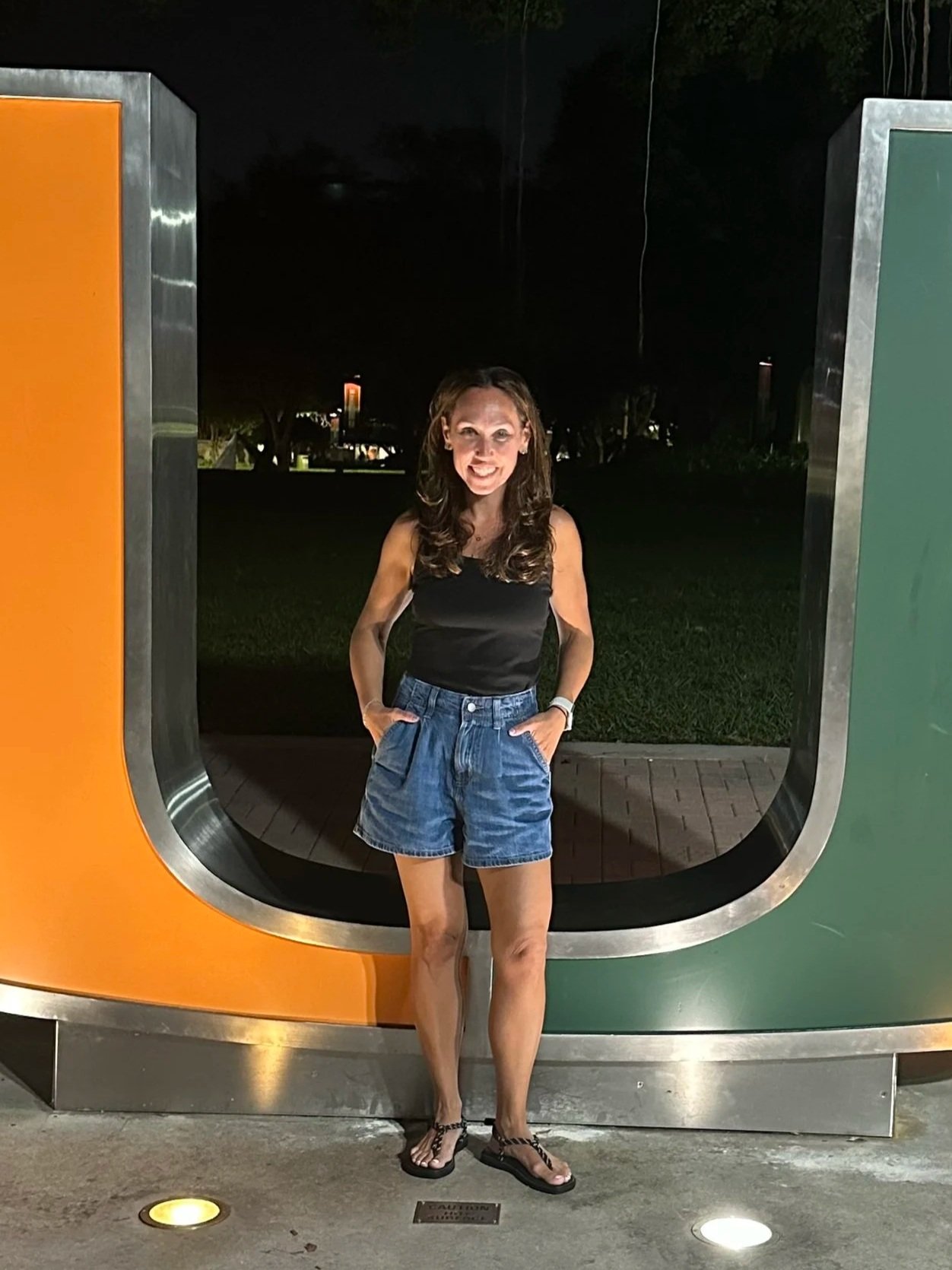 Lindsay Levine standing outdoors in the evening