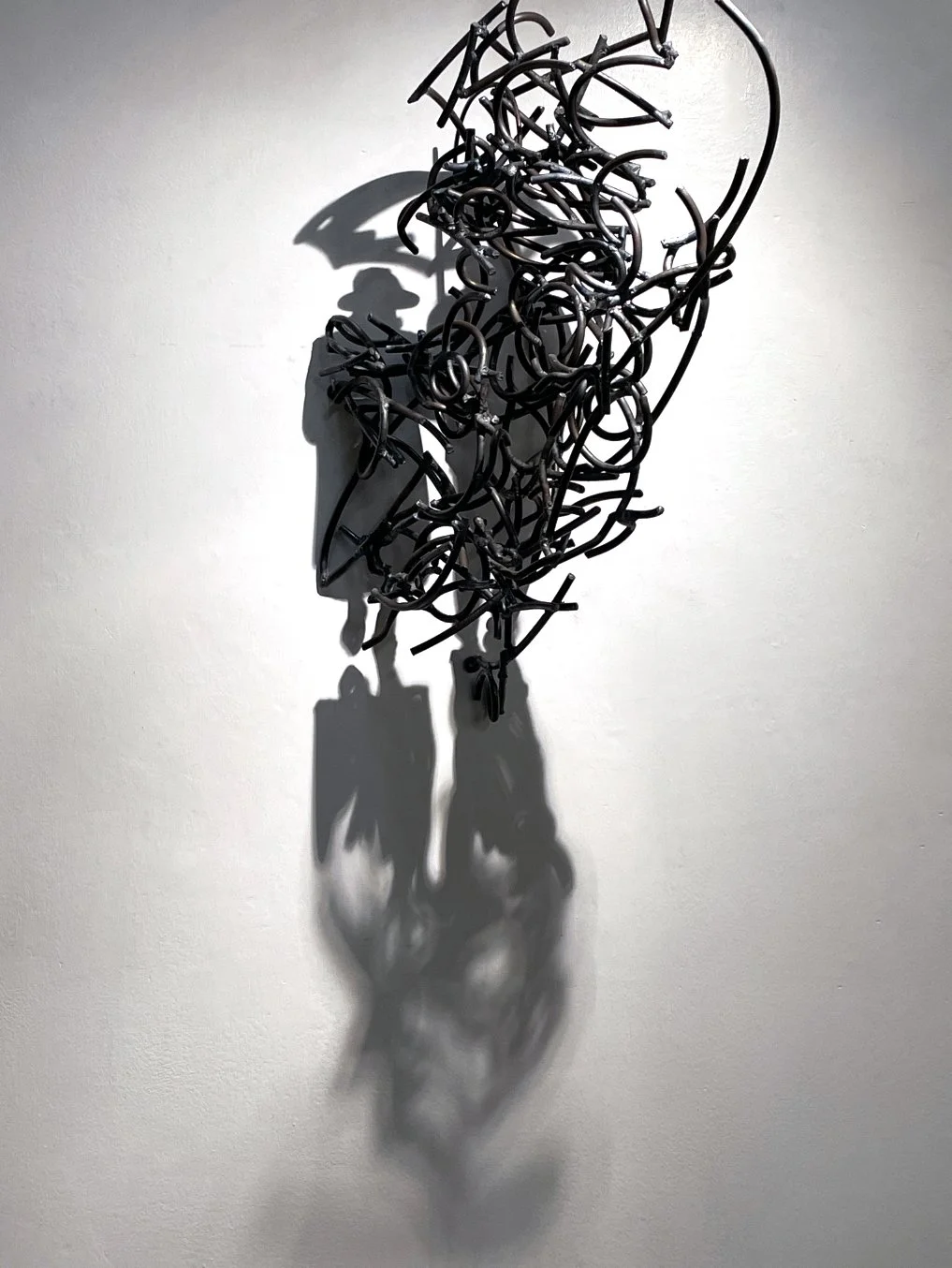 Kagan_A-Walk-In-The-Rain_2024_steel_27x15x19.jpg