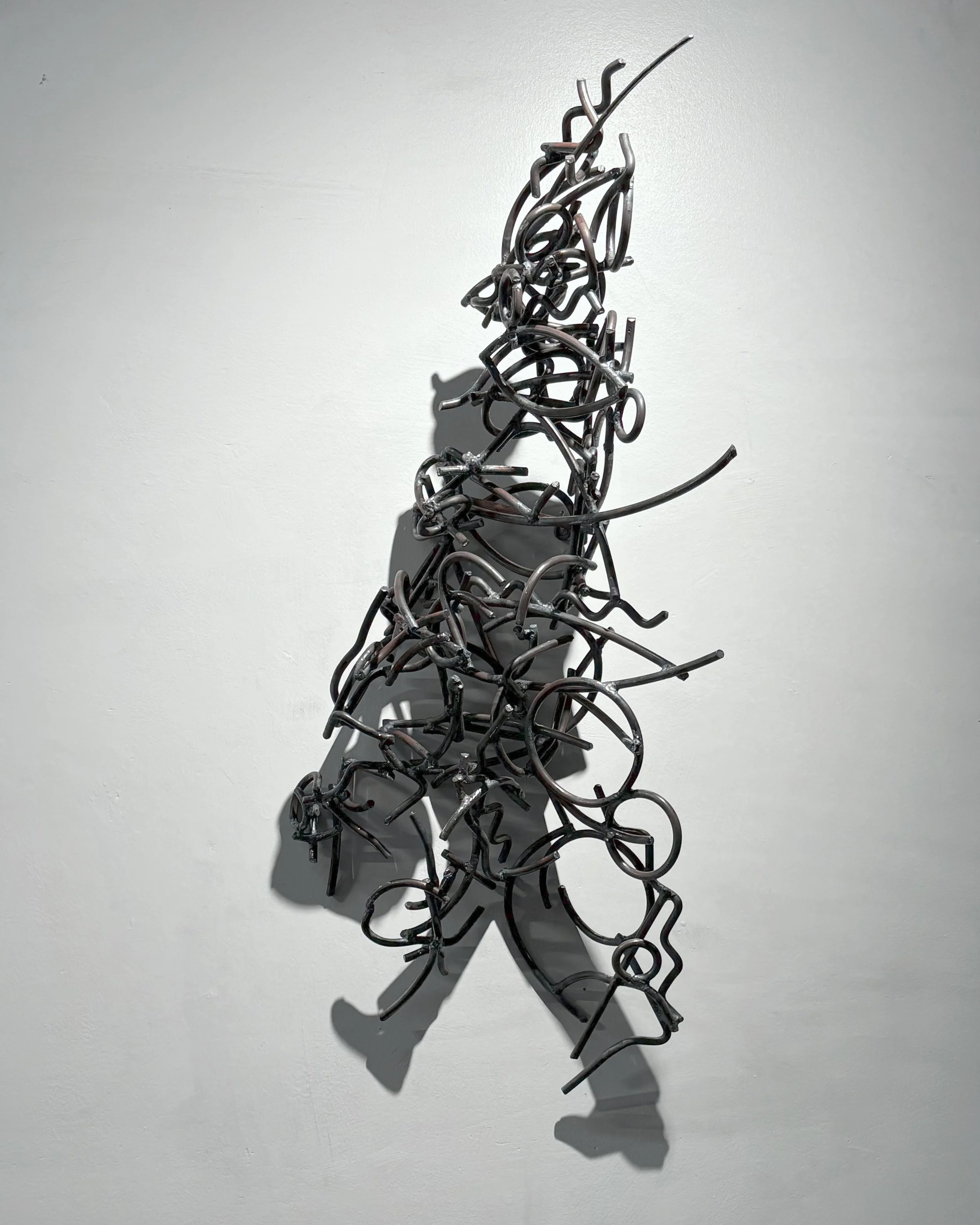 Kagan_Off-to-a-Long-Weekend_2025_Steel_34x15x13.jpg