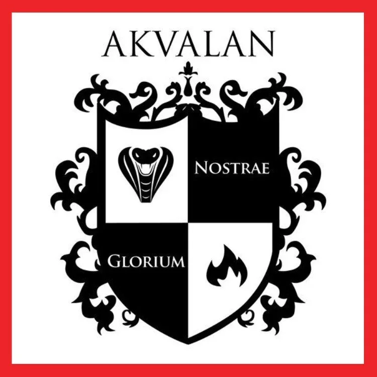 A shield with a snake head symbol in the top left, a flame symbol in the bottom right, and text reading 'NOSTRAE' and 'GLORIUM' in black and white sections. The shield is surrounded by decorative black floral elements and the word 'AKVALAN' at the to