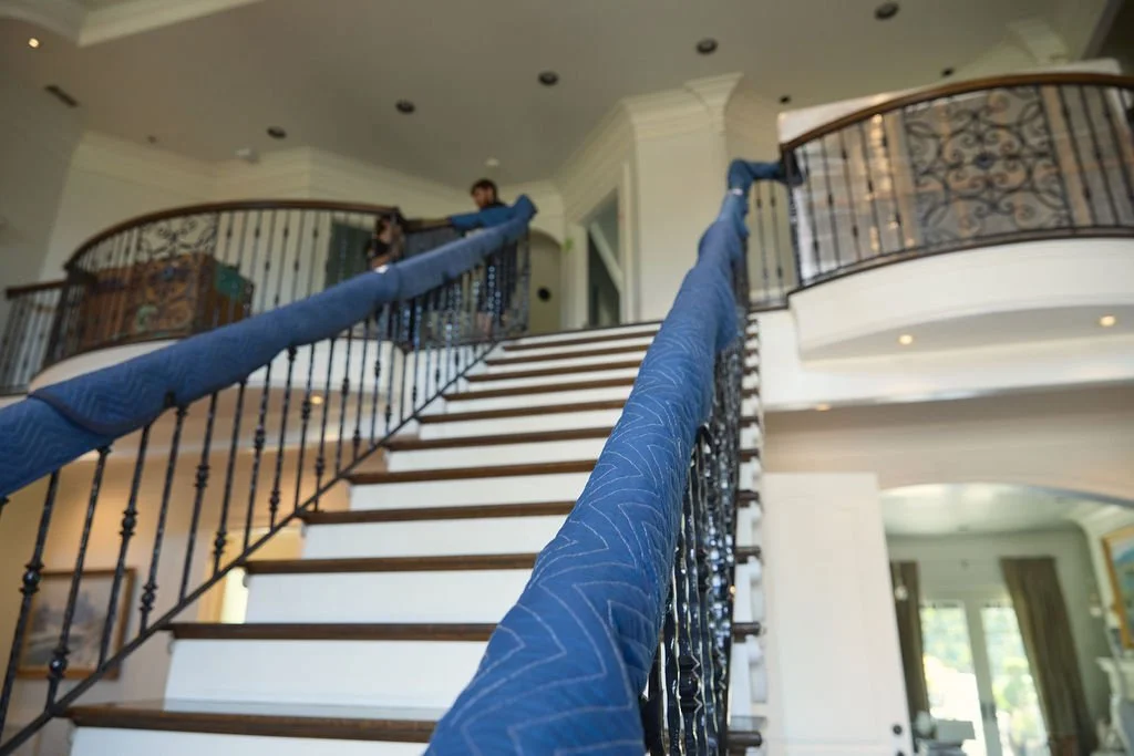 protected stair railings as we pack and move a Nashville home